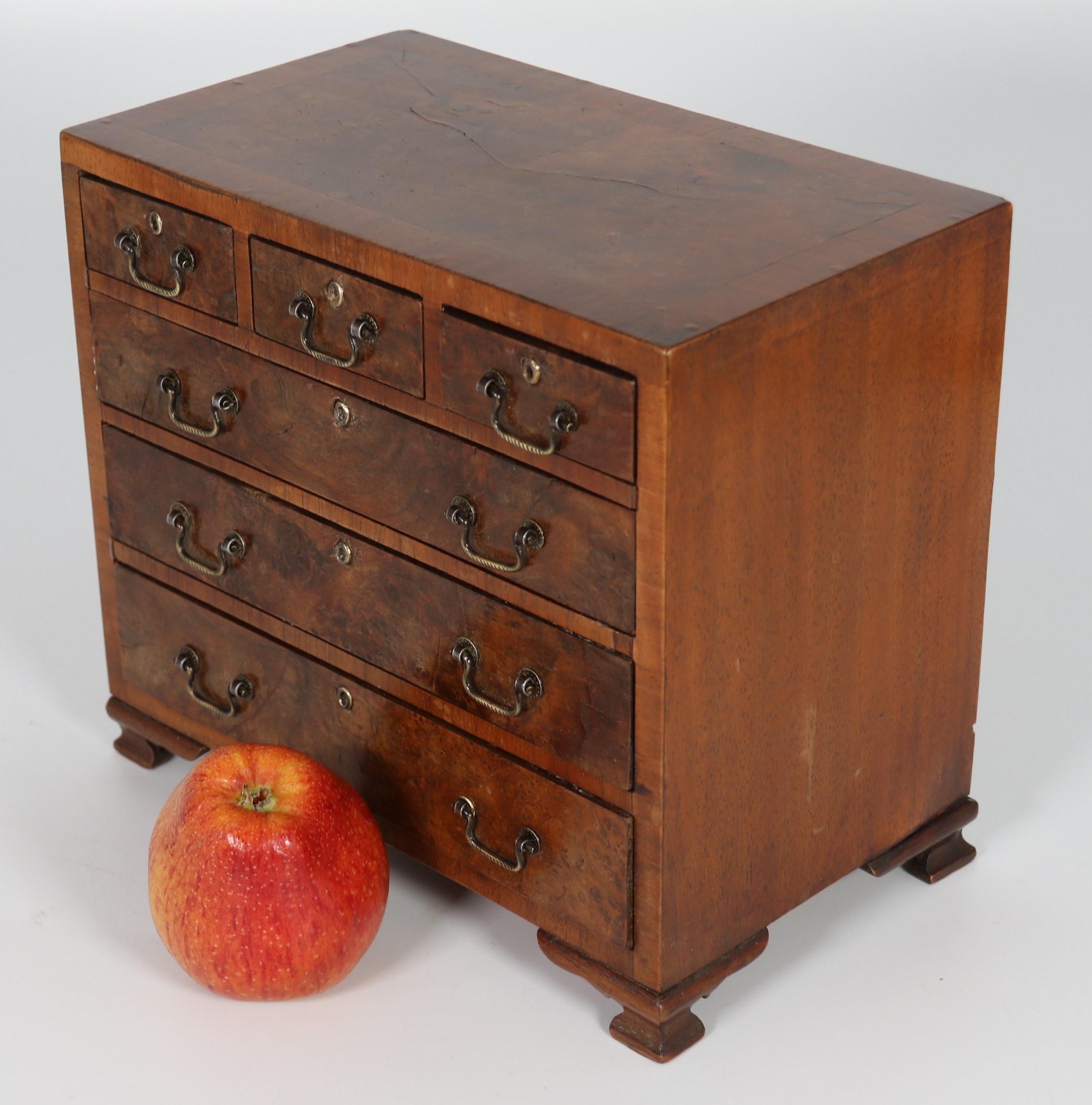 A miniature George II style figured walnut chest of drawers, English circa 1900 For Sale 7