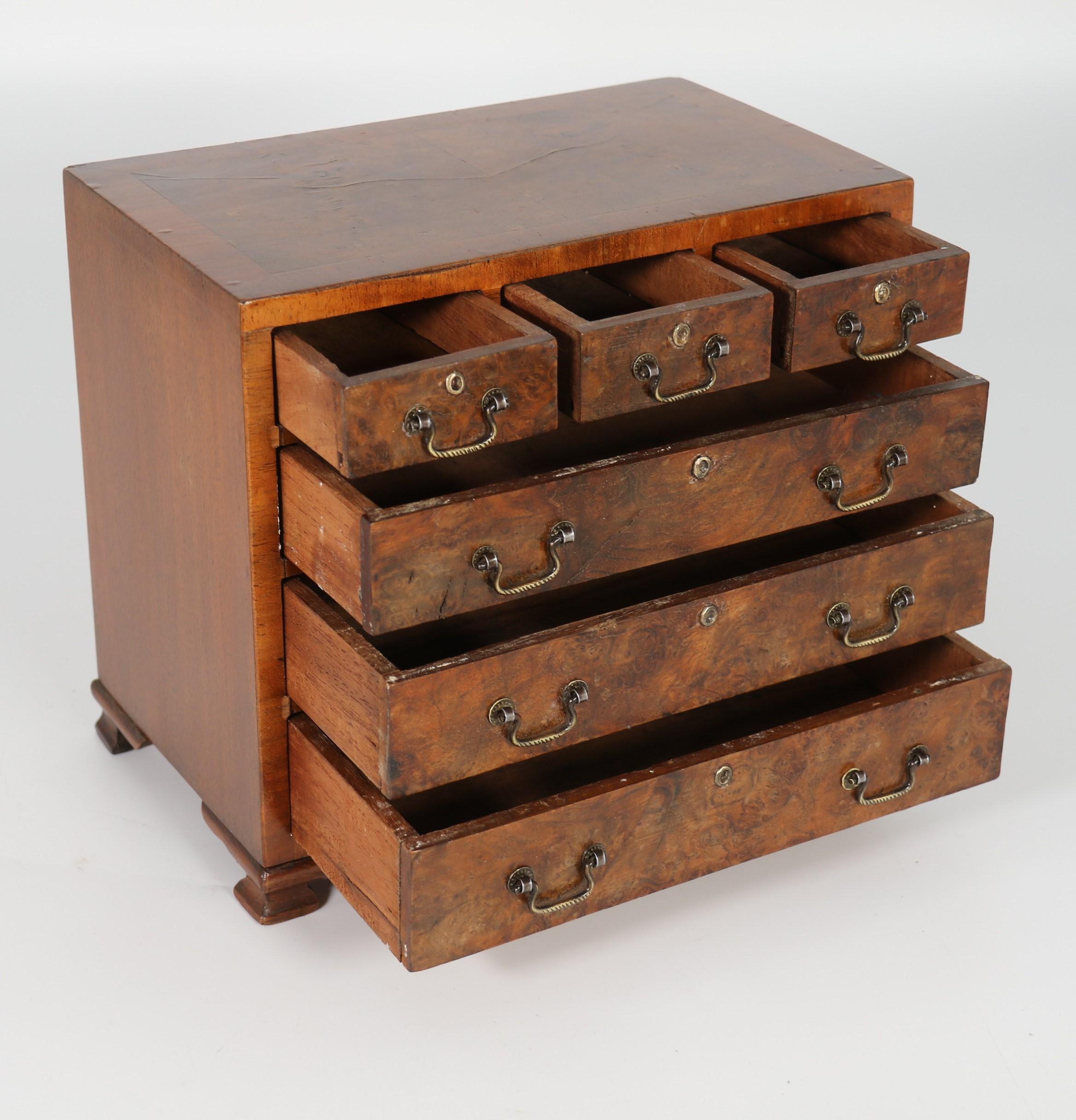 A miniature George II style figured walnut chest of drawers, English circa 1900 For Sale 8