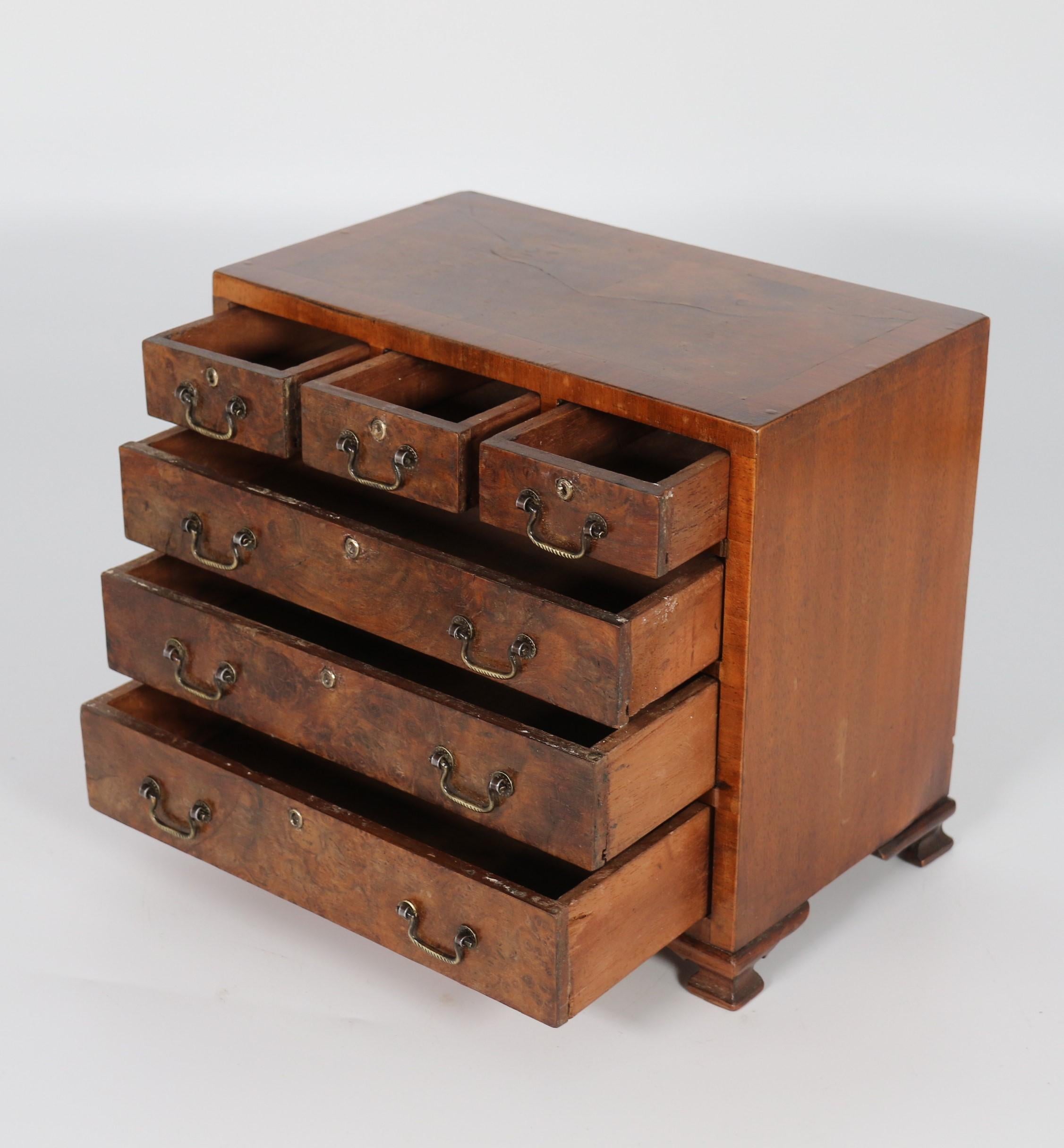 A miniature George II style figured walnut chest of drawers, English circa 1900 For Sale 10