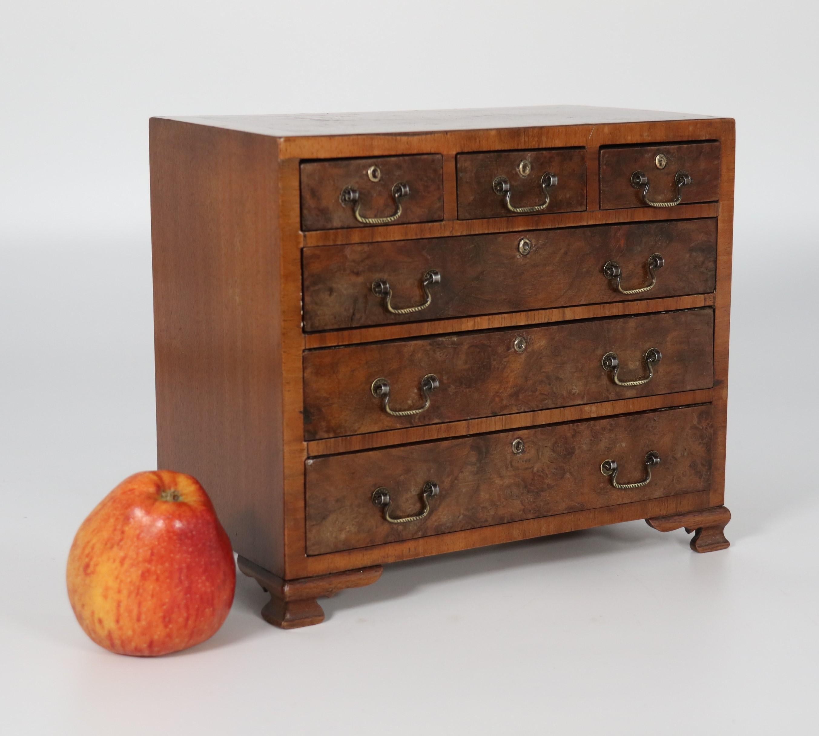 British A miniature George II style figured walnut chest of drawers, English circa 1900 For Sale