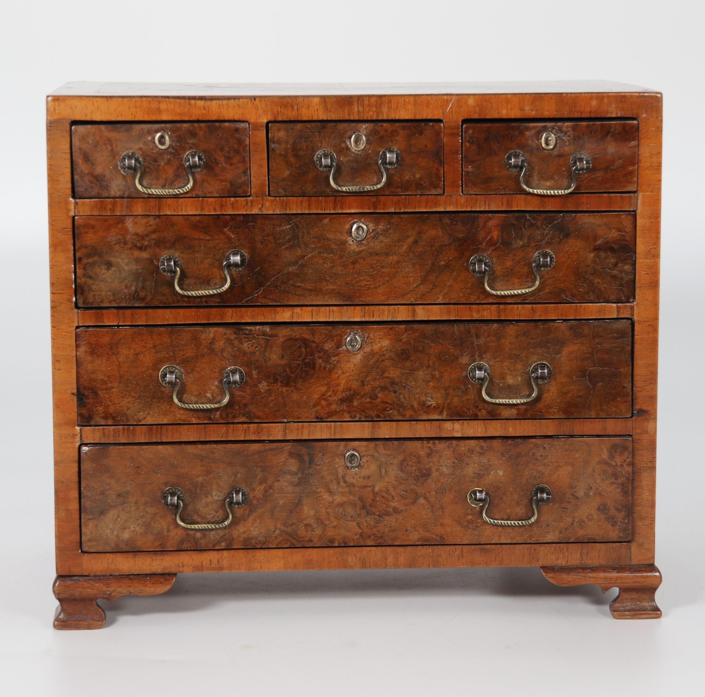 Hand-Crafted A miniature George II style figured walnut chest of drawers, English circa 1900 For Sale