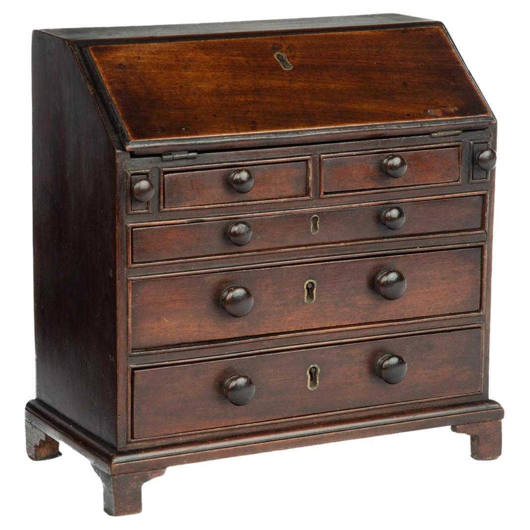 A miniature George III mahogany bureau For Sale