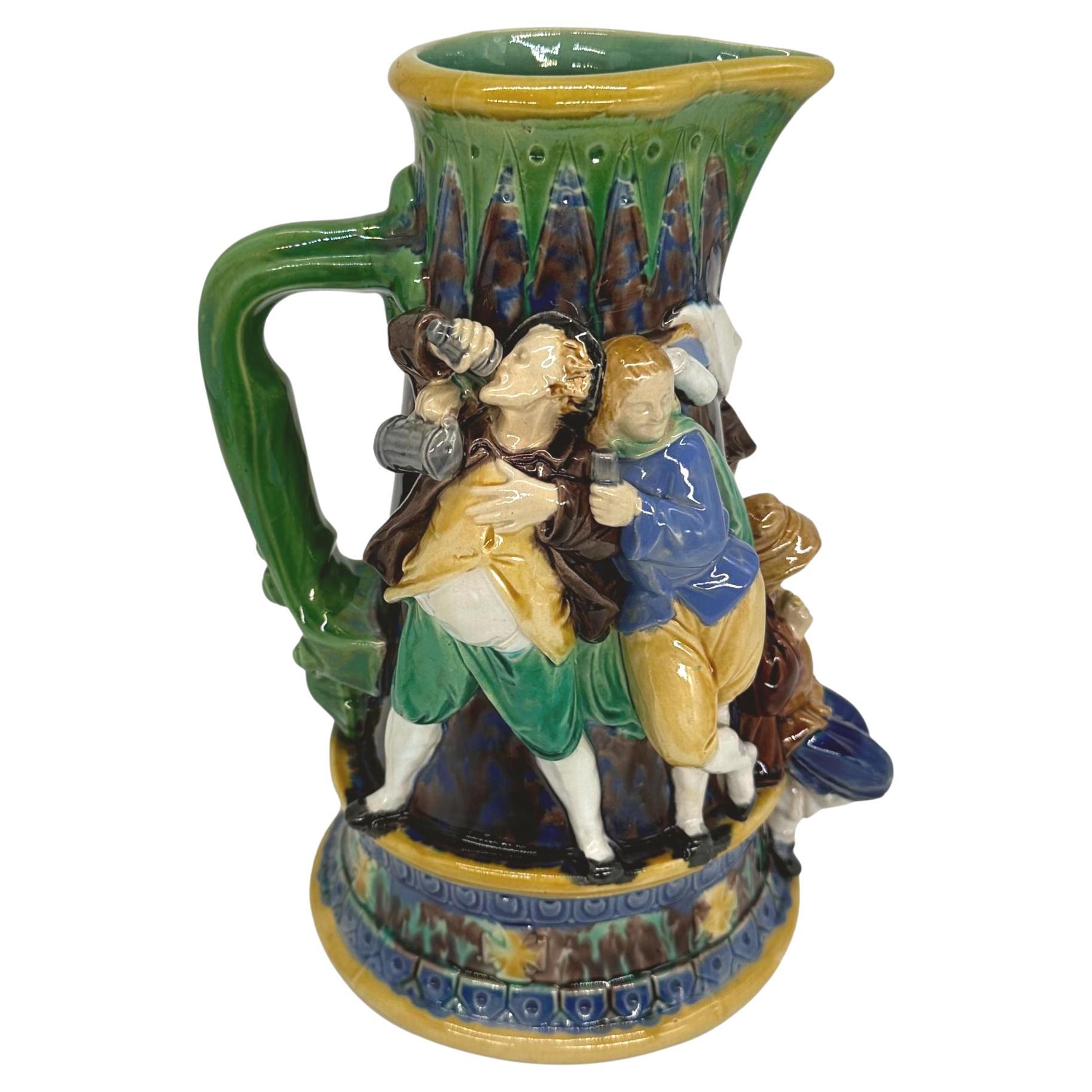 A Minton Majolica Ale Jug with Five Revelers in Medieval Dress, dated 1862 For Sale