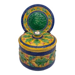 A Minton Majolica Christmas Tureen, Cover, and Stand, English, Dated 1867