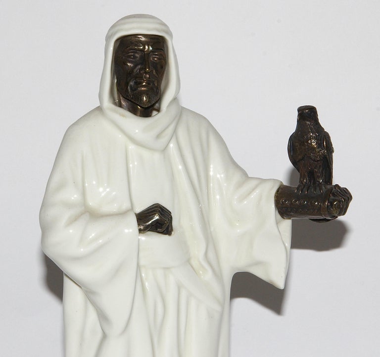 A Minton porcelain and bronze sheikh figurine. Arab with falcon.

Perfect condition.