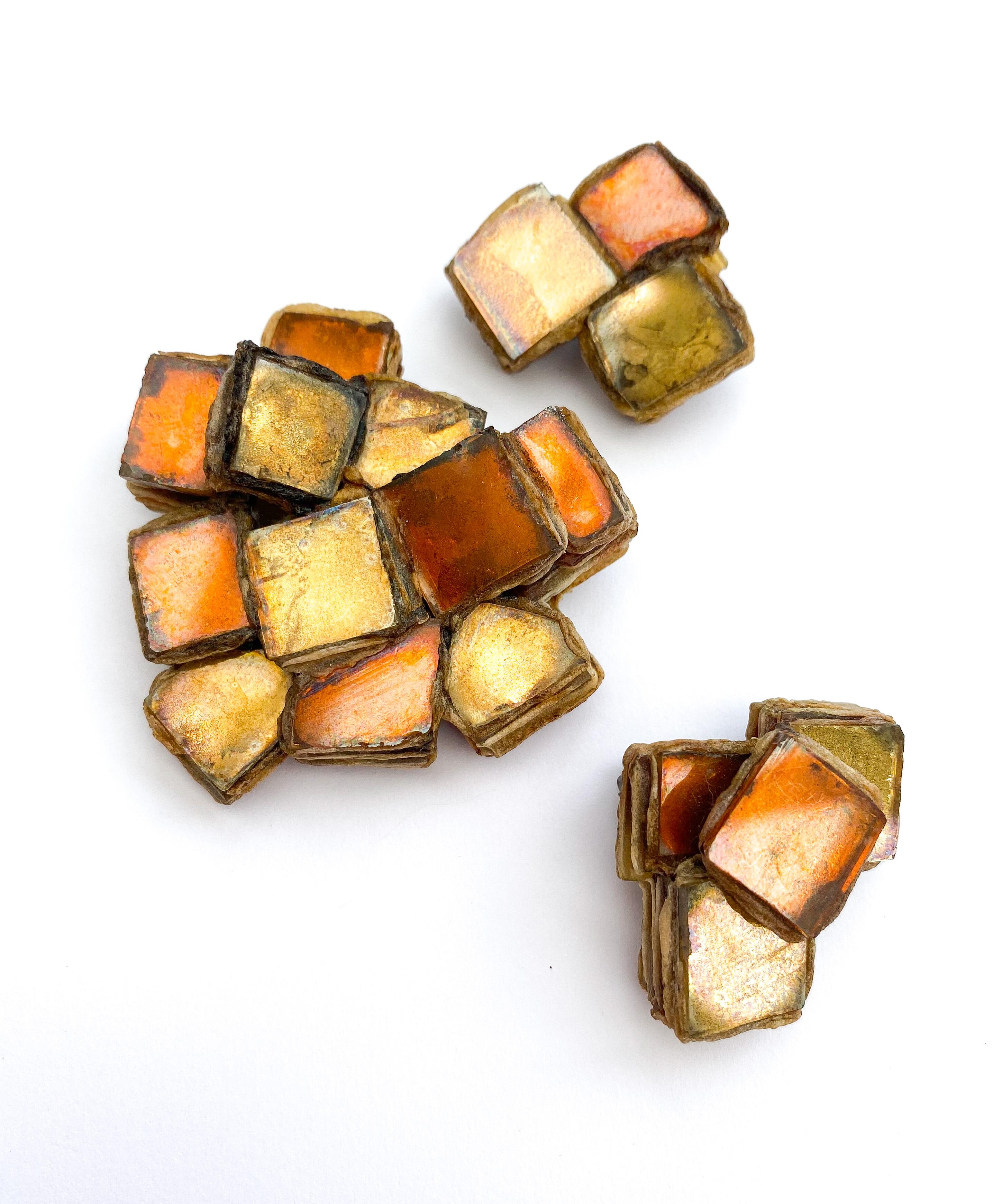 This Talousel and mirrored glass brooch and earrings is a fine example of the later work of Line Vautrin from the 1960s. A most beautiful and unusual colour, each piece is truly artisan, made and assembled by hand. The delicate mirrored and resin