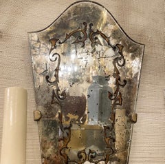 A Mirrored Sconce