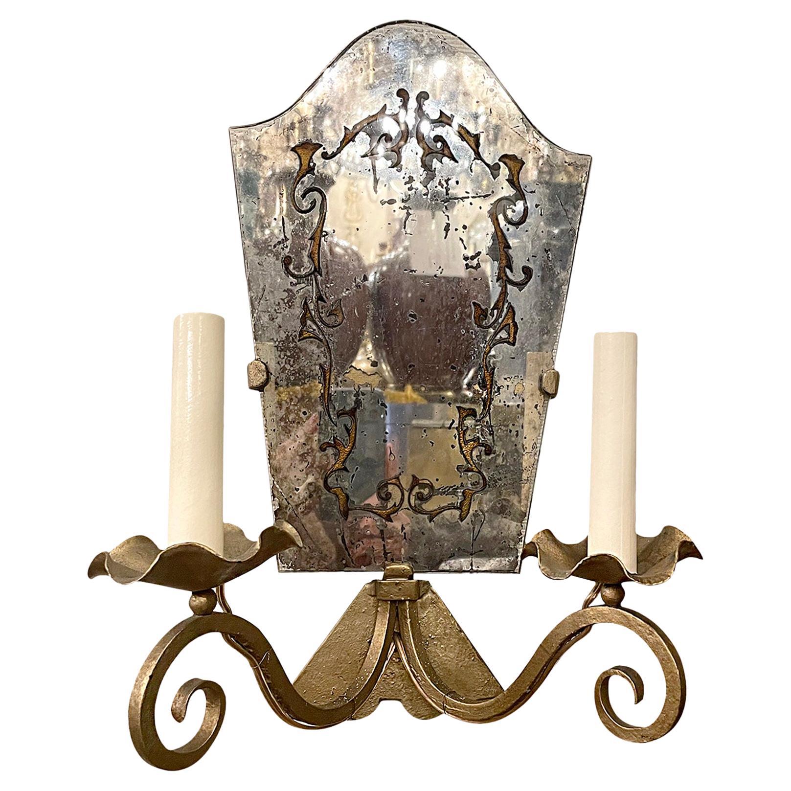 A Mirrored Sconce