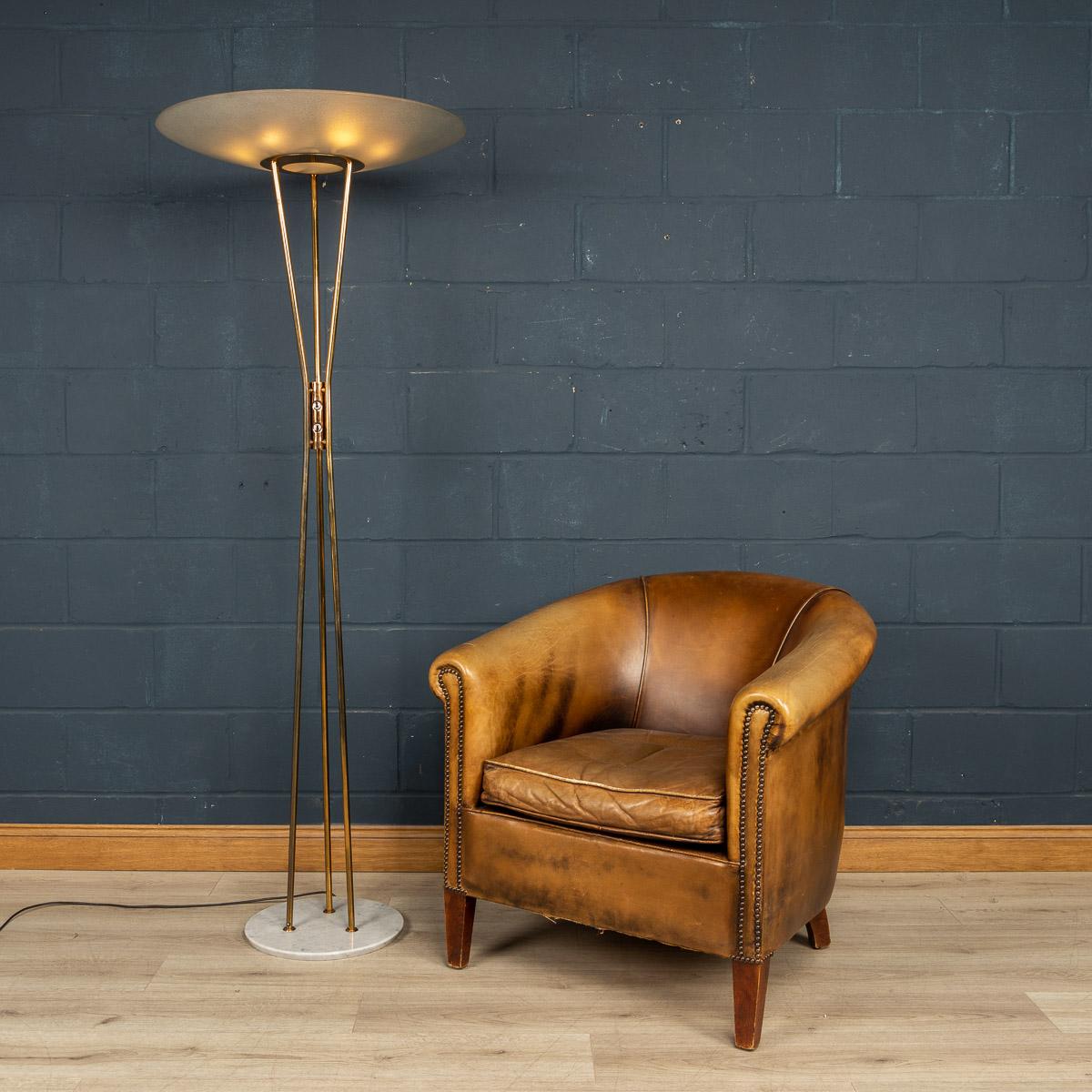 A stunning floor lamp by Gaetano Sciolari made by Stilnovo of Italy around the 1960s. Sciolari was at the forefront of design in that period. It is hard to overstate how futuristic his designs looked at the time and how influential his designs were.