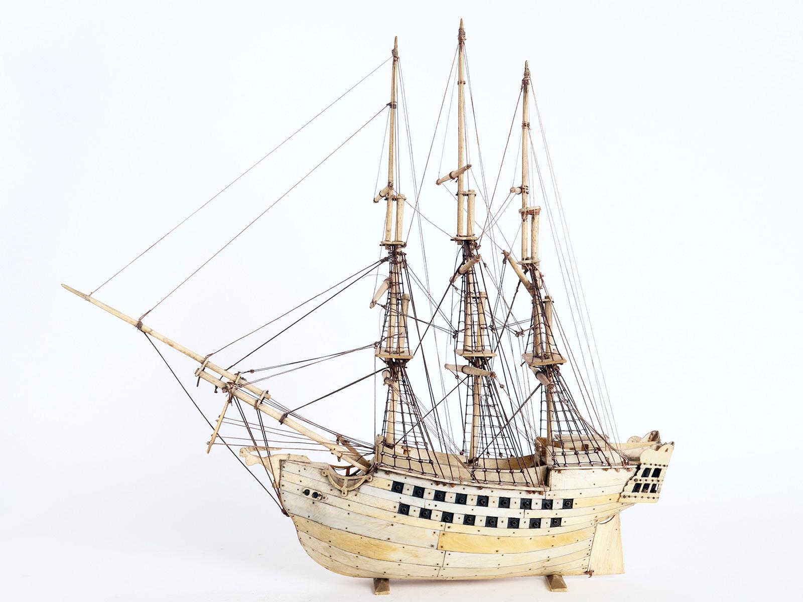 A British model of a sailing ship, made out of bone. Made by French prisoners of war (POWs), held in British prisons, during the Napoleonic Wars, which took place from 1793 to 1815 and the following years. Prisoner of War Models, as model ships like