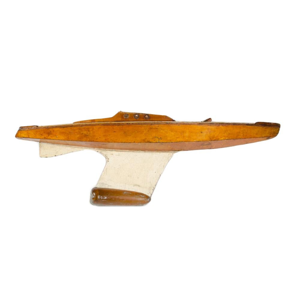 A model ship sailboat with a white and brown body with brass Keel, early 20th C 1