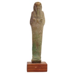 Antique A modelled pale turquoise glazed Ushabti, Circa 26th Dynasty 664-525BC