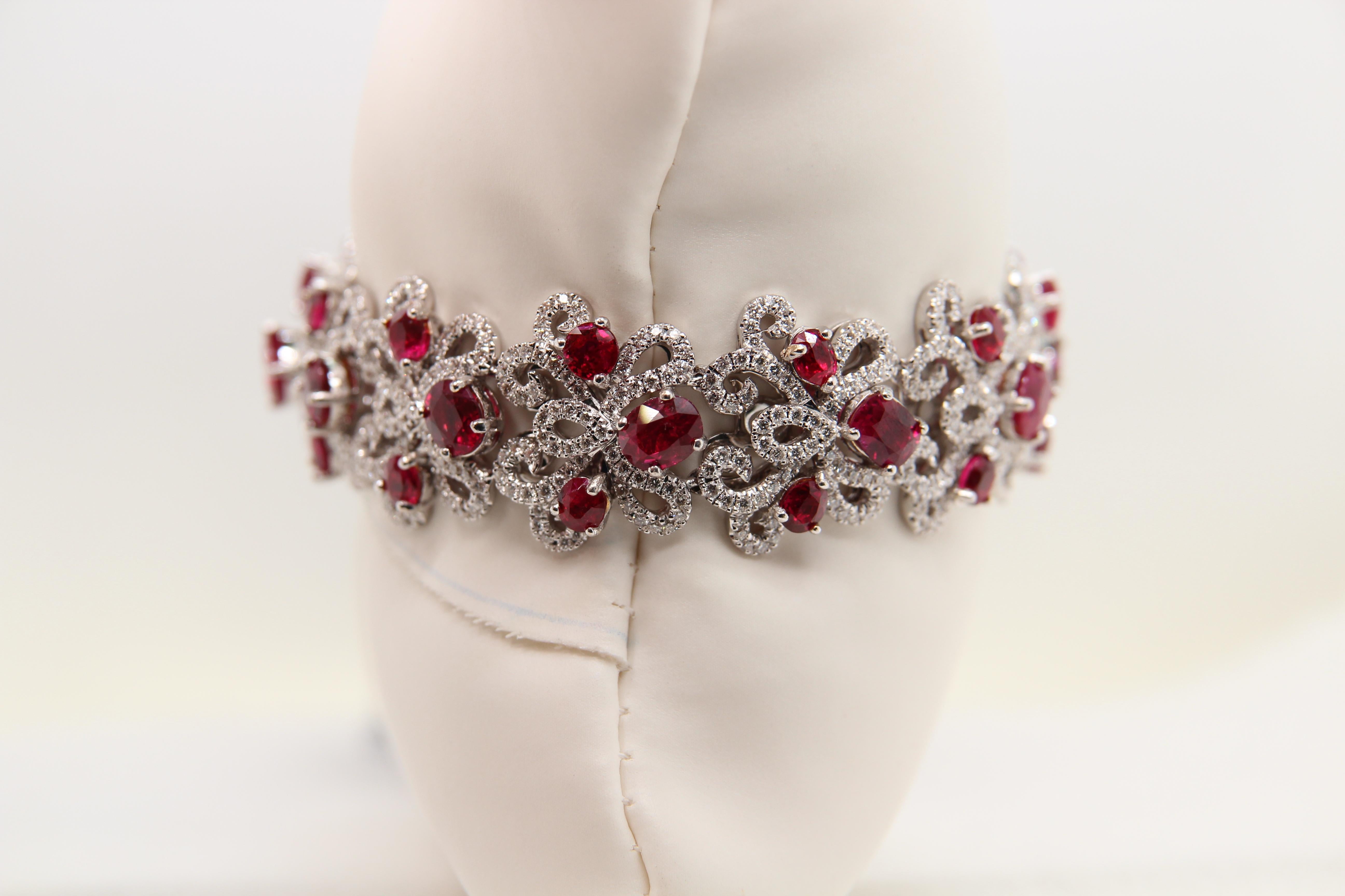 A new ruby and diamond bracelet made in 18 Karat gold. The rubies are all Burmese no heat certified by the International Colorstone Association (ICA) GemLab. The total ruby weight is 16.20 carats and the total diamond weight is 4.70 carats. The