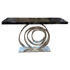 A modern console aluminium and wood lacquered
