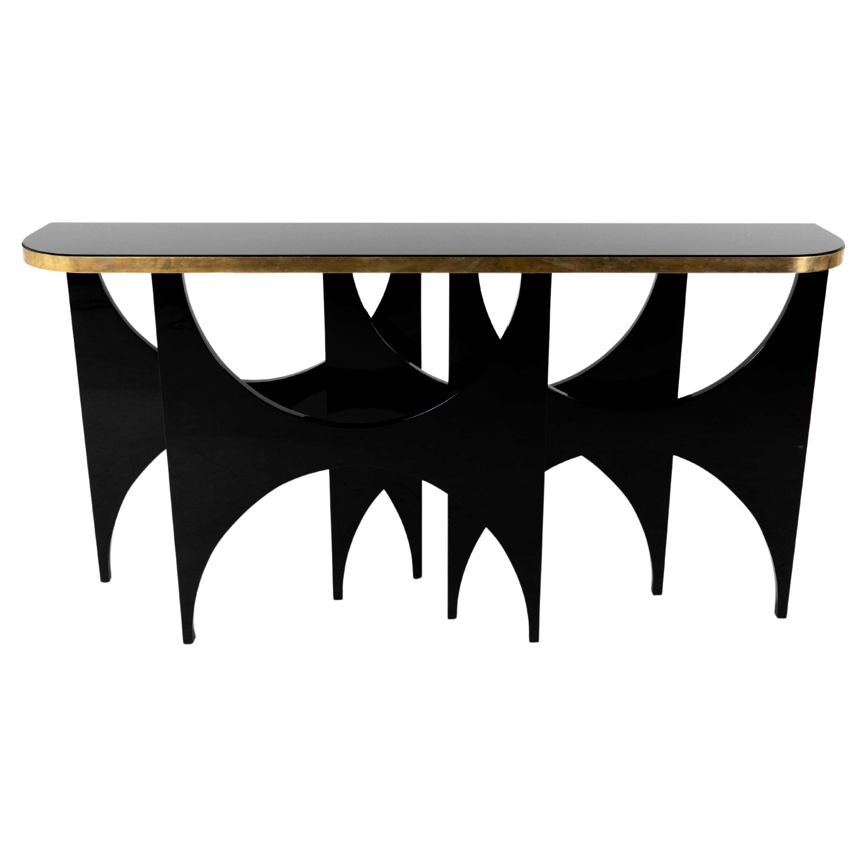 A Modern Console Table With Lacquered Base and Black Glass Top For Sale