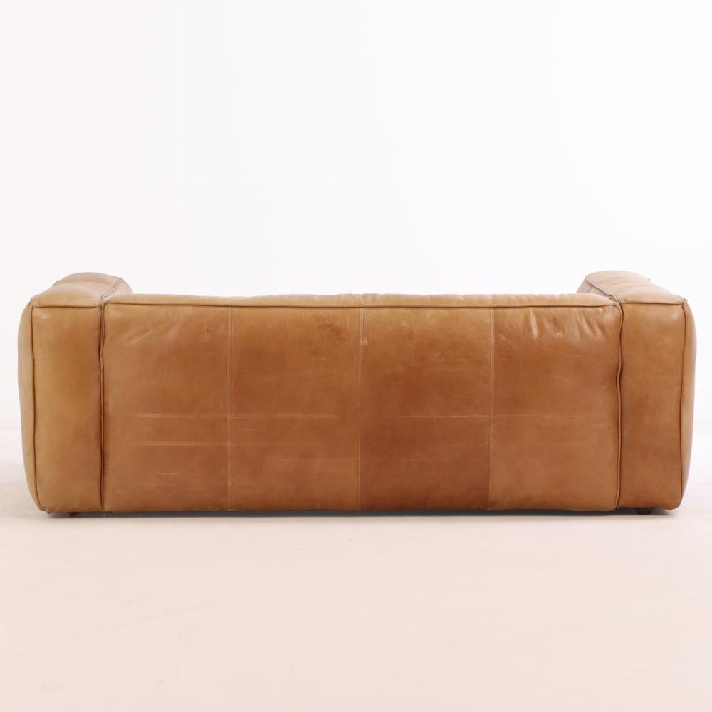A Modern French leather sofa, C. 1975. In Good Condition For Sale In Philadelphia, PA
