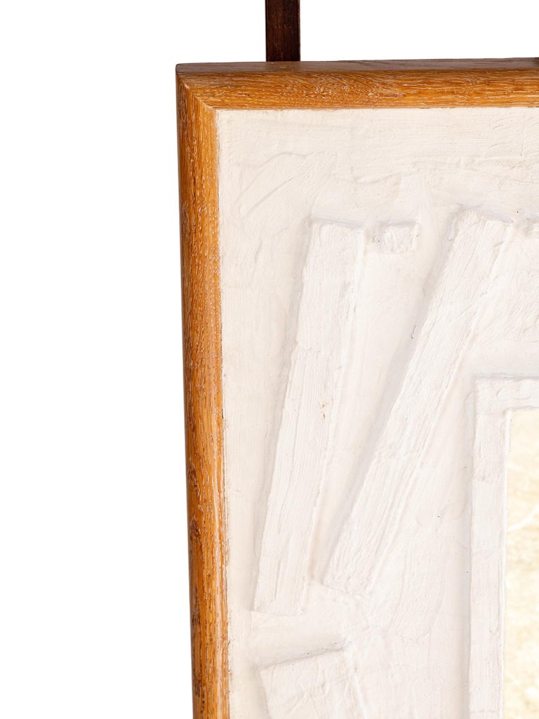 A modern plastered mirror in the style of French Provençal artist Jean Jaques D’Arbaud.