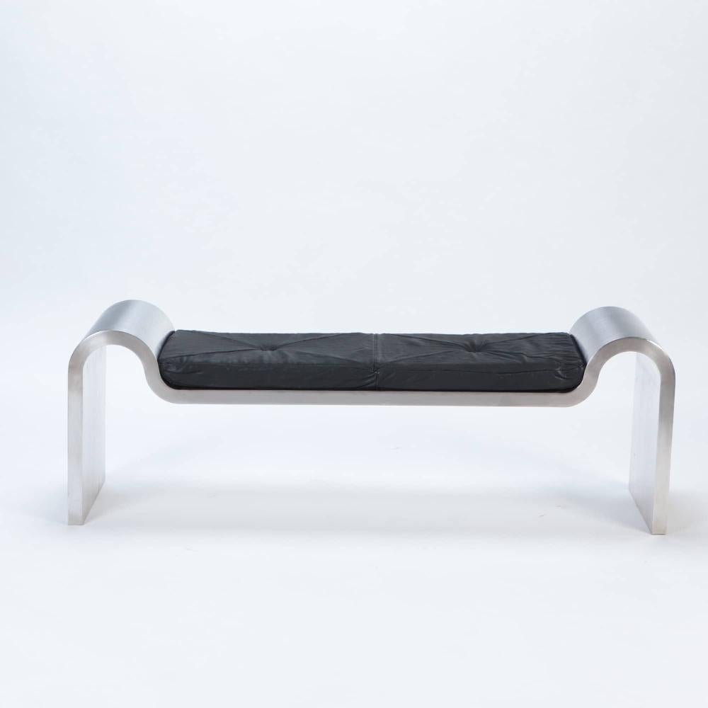 A  Modern Stainless steel and leather bench in the manner of Karl Springer, American , circa 1980.