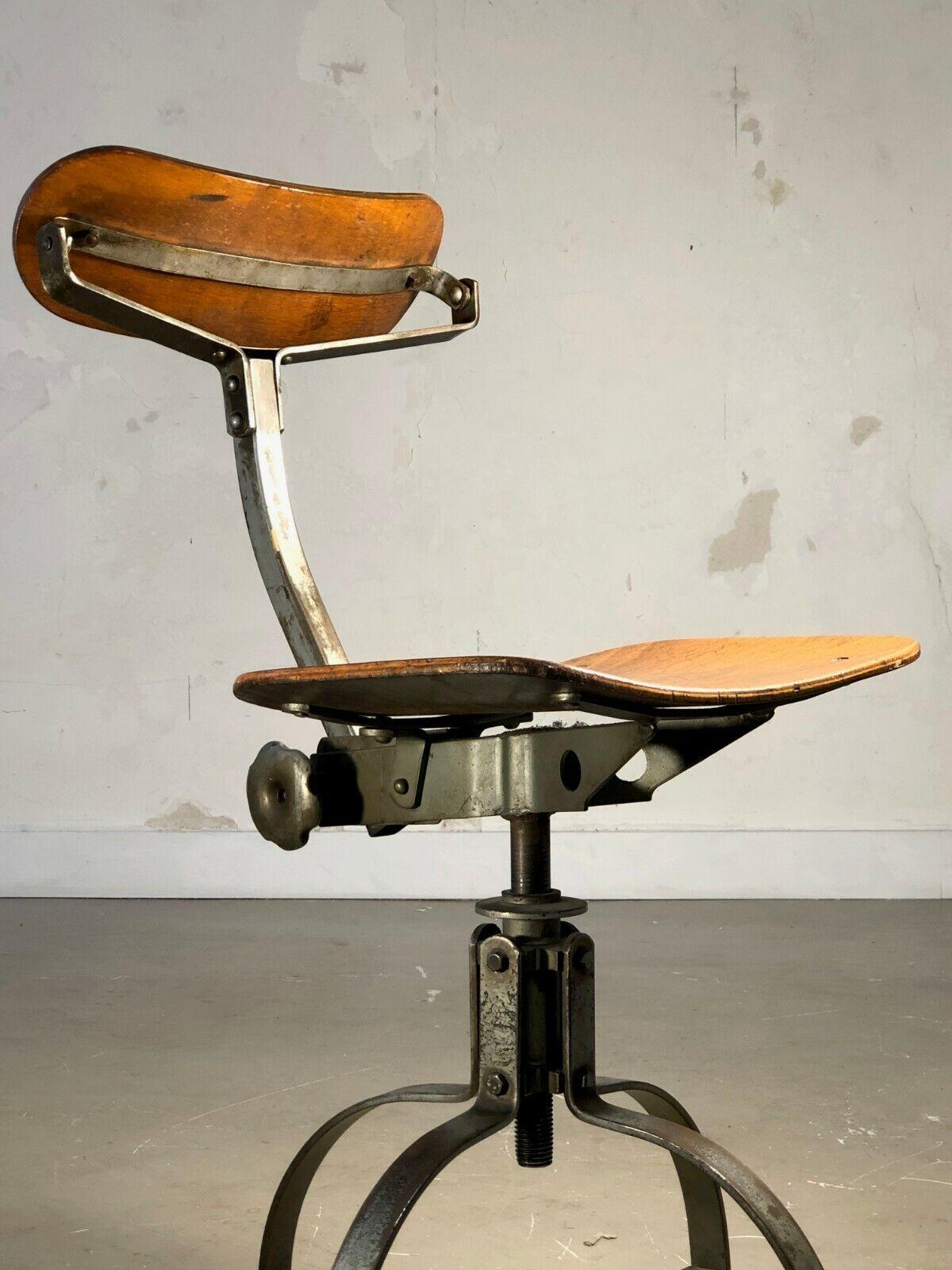 A MODERNIST ATELIER CHAIR, in Jean Prouvé Style, France 1950 For Sale 1