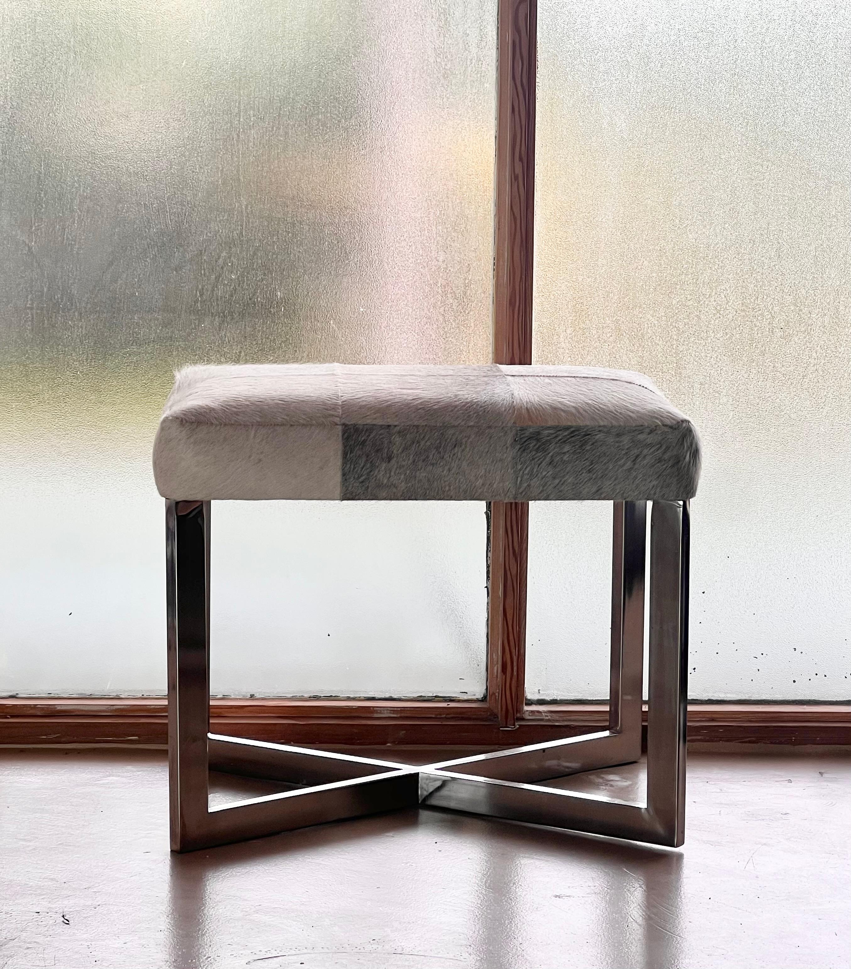 A modernist cowhide and chrome ottoman, 20th century. For Sale 13