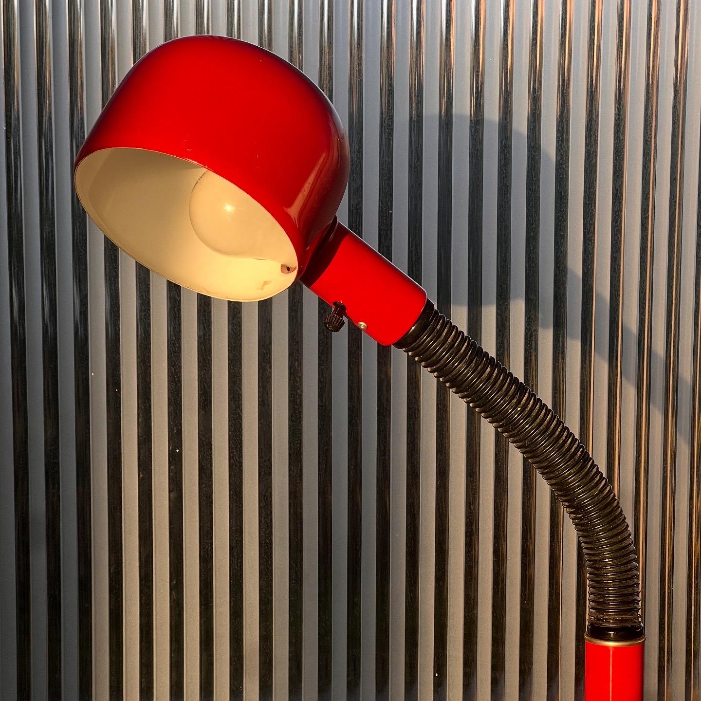 An mcm gooseneck floor lamp in cherry red, mid 20th century. Attributed to Alsy. Works beautifully. Pick up in LA or we ship worldwide. 
Fully extended: 57” height
Bent at 90degree angle: 42” height
Base: 10” diameter 