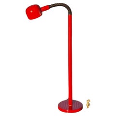 A modernist gooseneck floor lamp in cherry red, mid 20th century