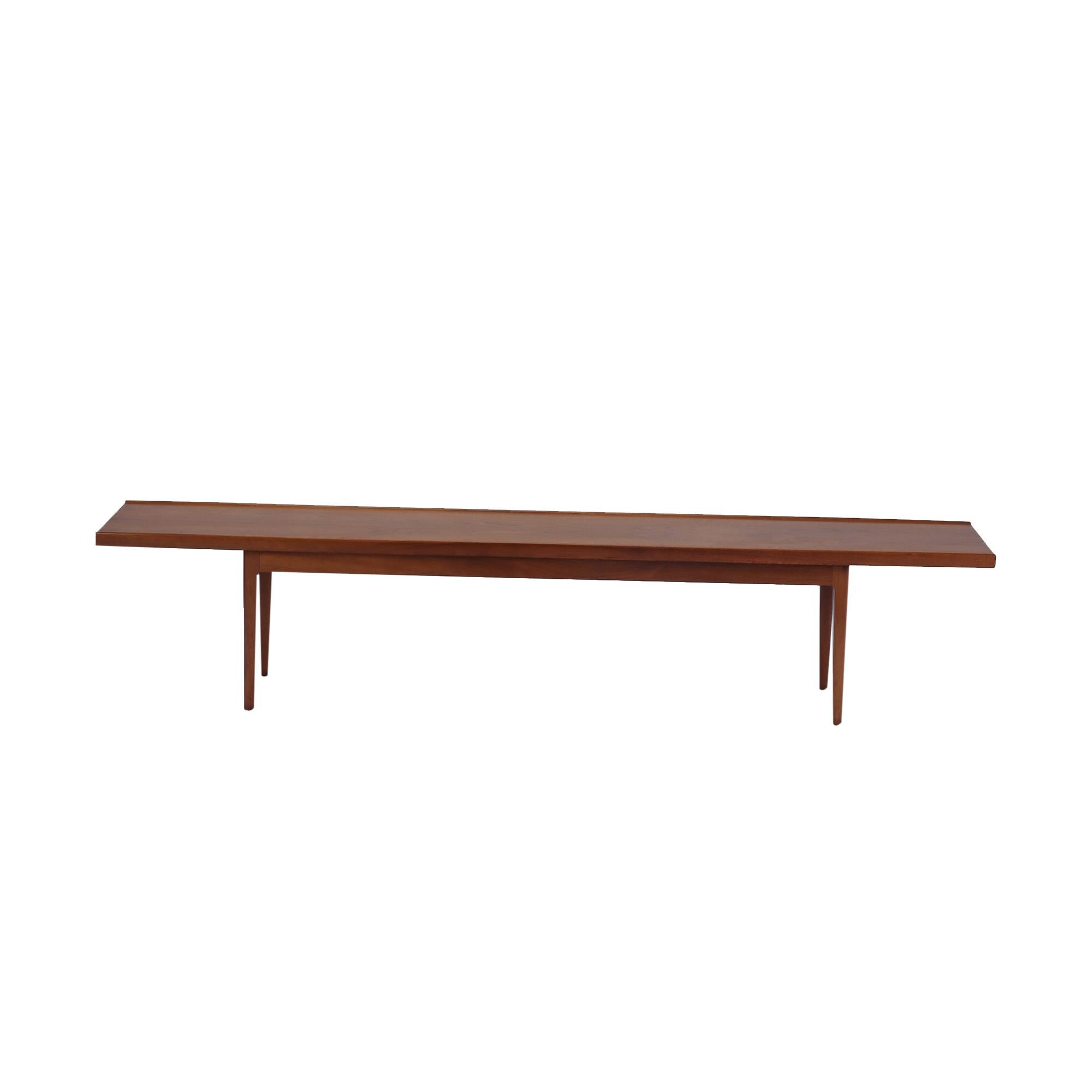 Modernist walnut bench table by Kipp Stewart for Drexel Furniture.