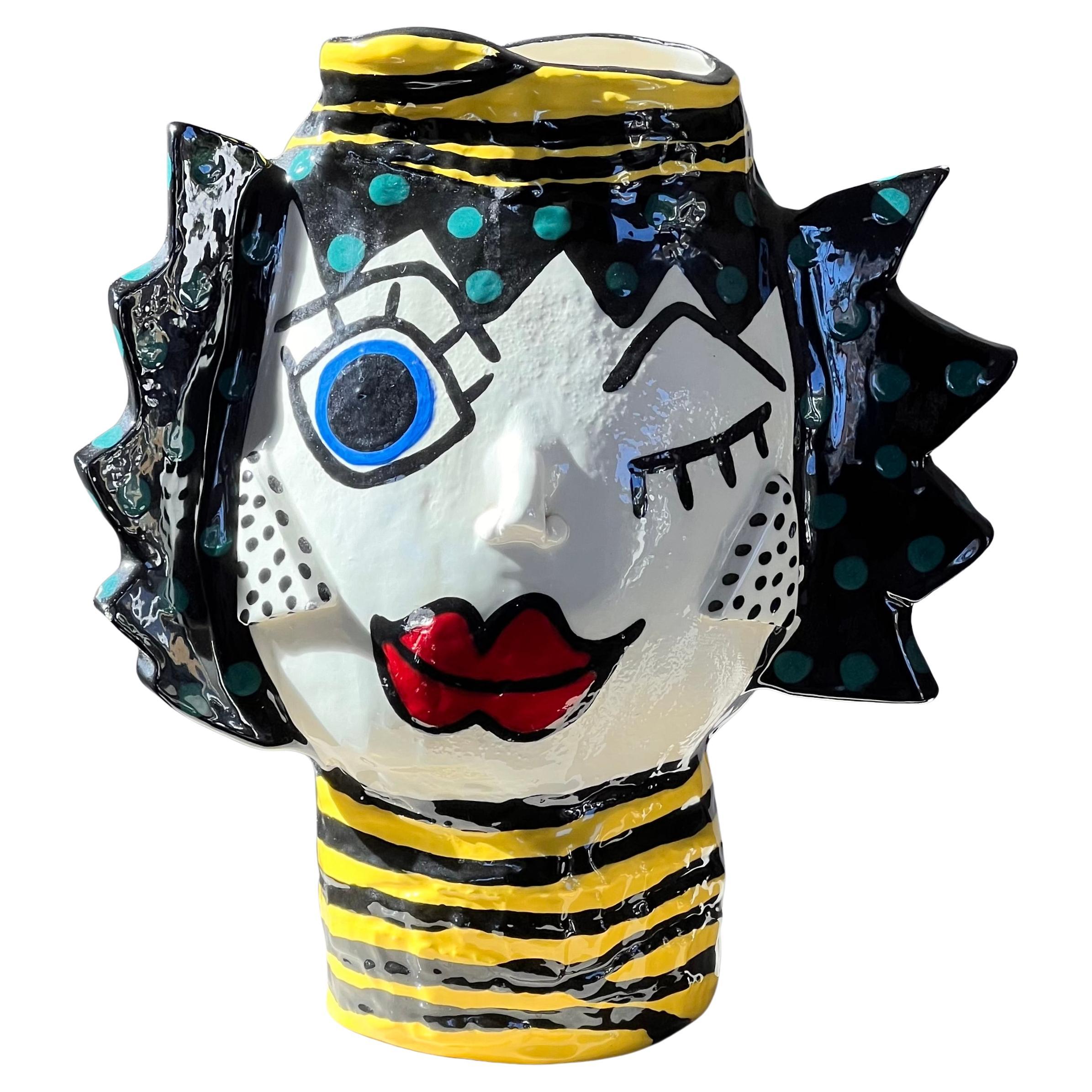 A modernist painted ceramic face vase, signed by artist, 20th century