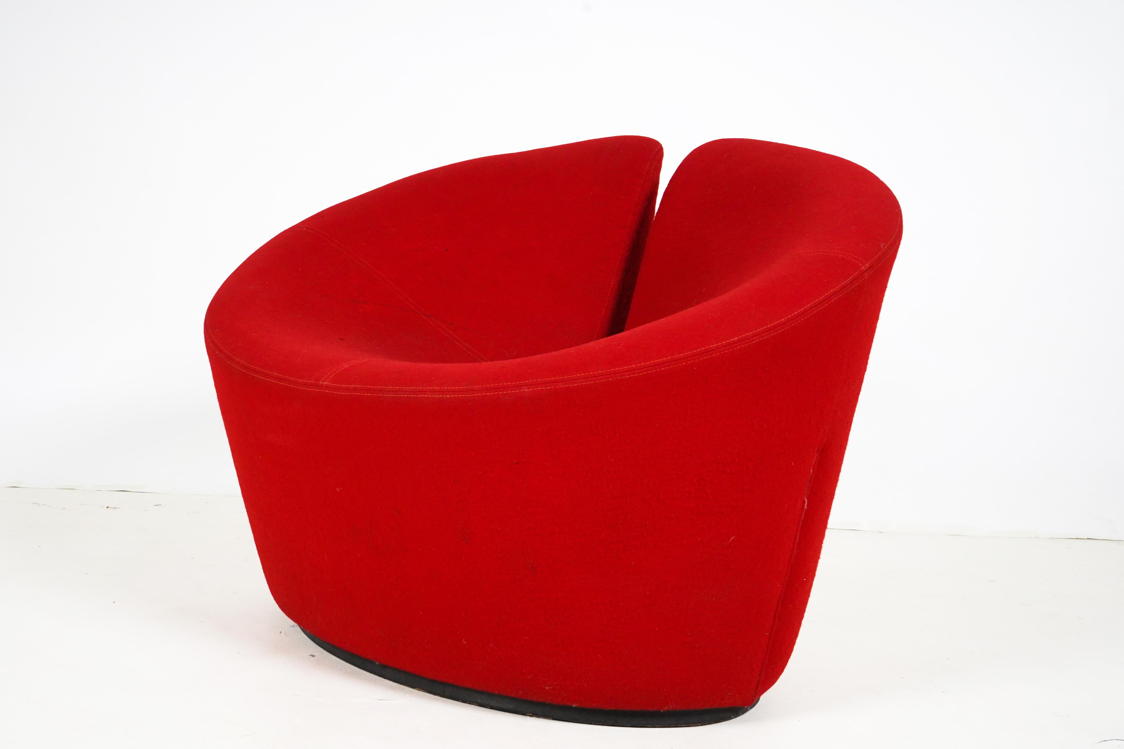 A vintage Danish True Love lounge chair in original red boucle fabric. This is a beautiful and incredibly comfortable eye-catcher by design group Globe Zero 4, from designers Flemming Busk and Stephan Hertzog. The chair is made from molded