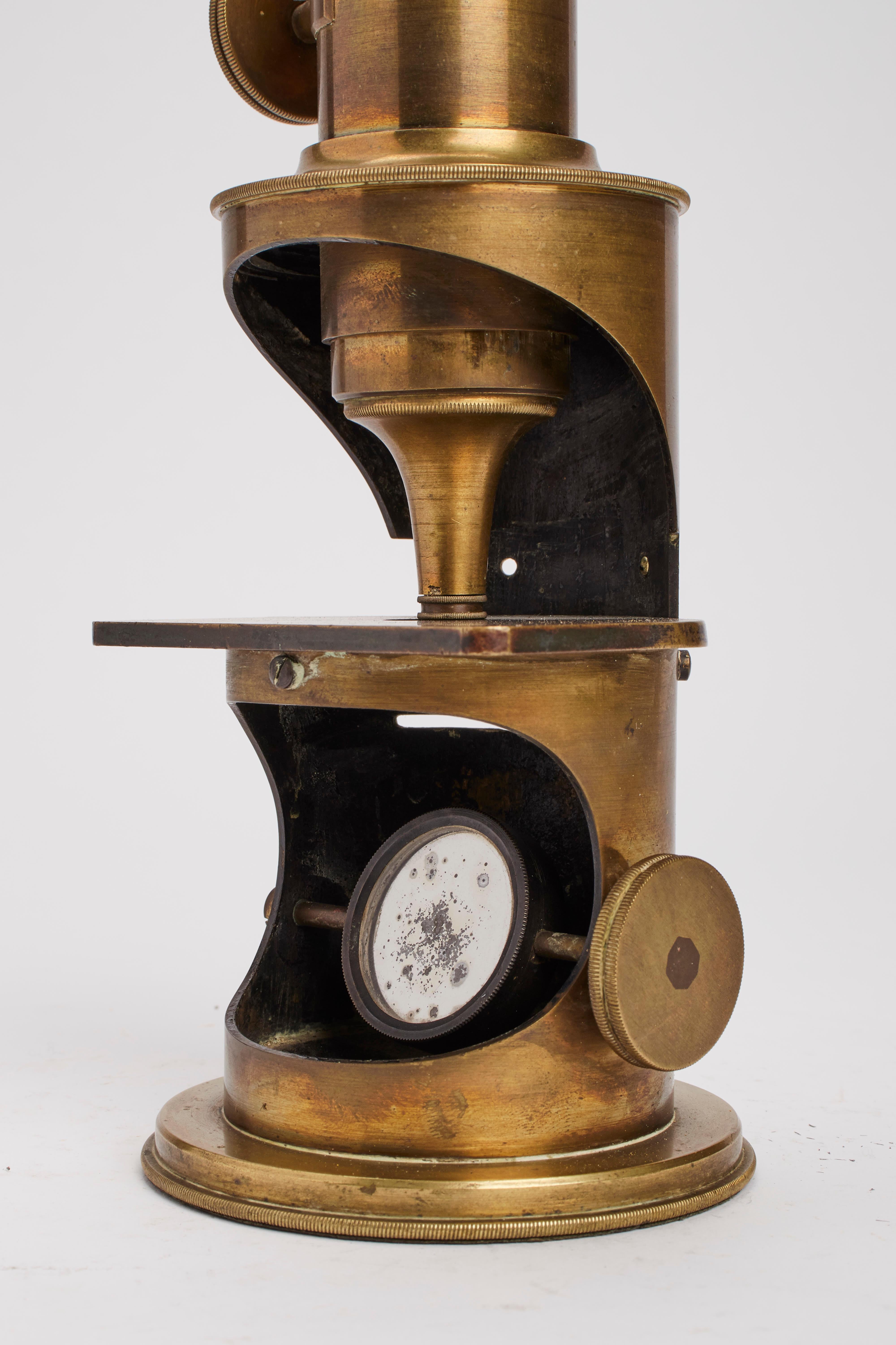 Brass A monocular microscope with wooden box, France 1800.  