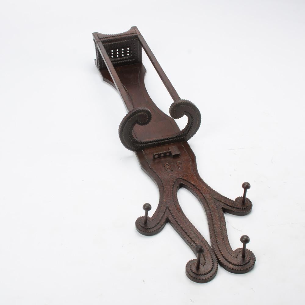 A  monogrammed 19th century Tramp Art hall tree with pipe holder. In Good Condition For Sale In Philadelphia, PA