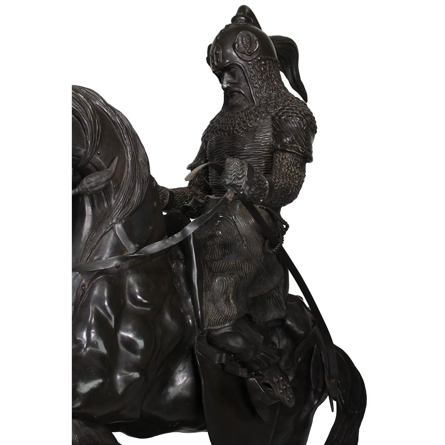 Patiné Sculpture monumentale en bronze d'un guerrier Tartar tenant son cheval d'après Barye en vente