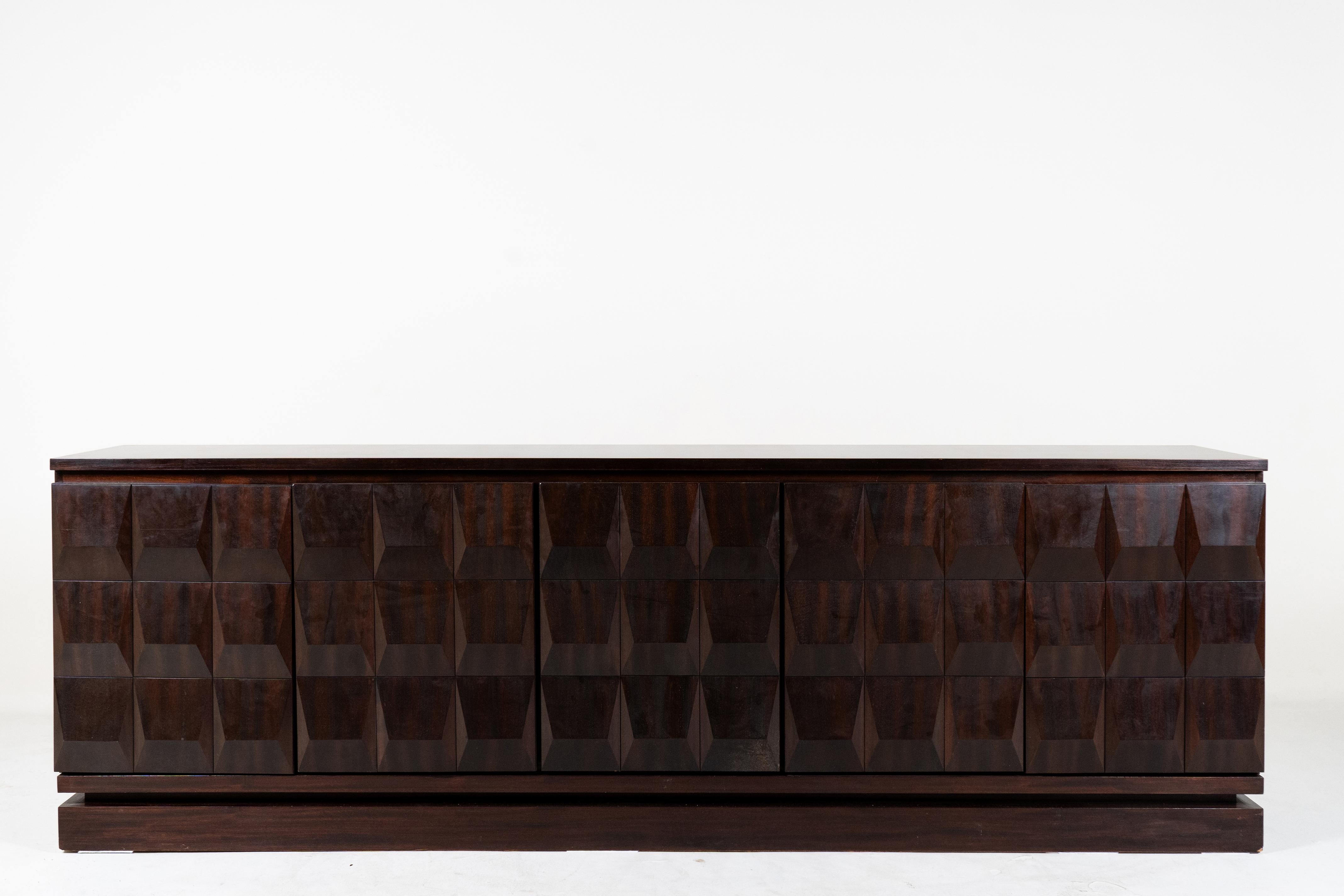 This monumental sideboard was made by  De Coene Frères, an elite Belgian furniture manufacturing company that operated from 1889 until the early 1970s. Over the years, De Coene Freres Produced a wide range of furniture from high quality materials