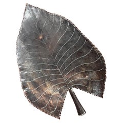 A monumental brutalist iron leaf centerpiece, 20th century