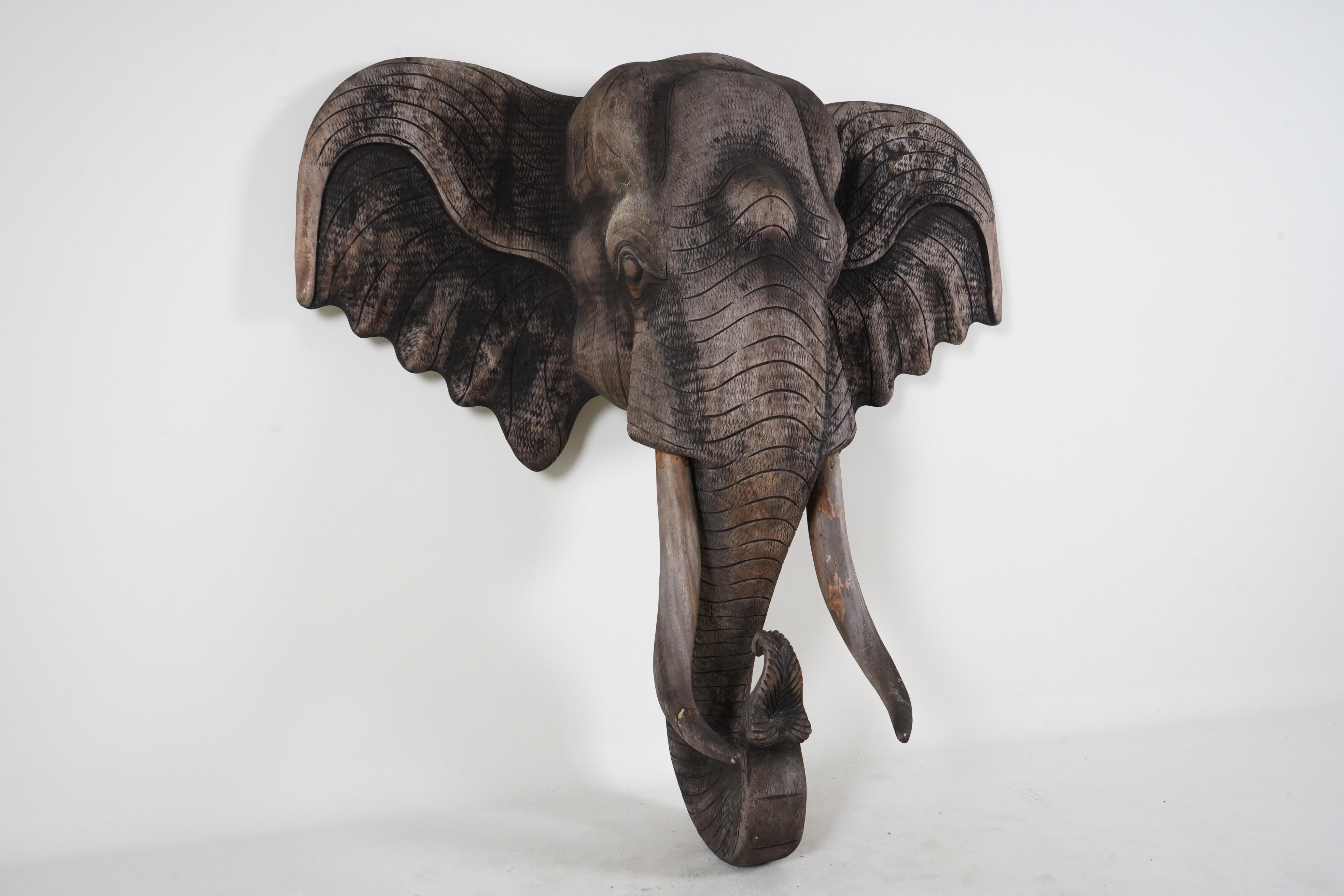 Hand-Carved A Monumental Carved Wood Elephant Head