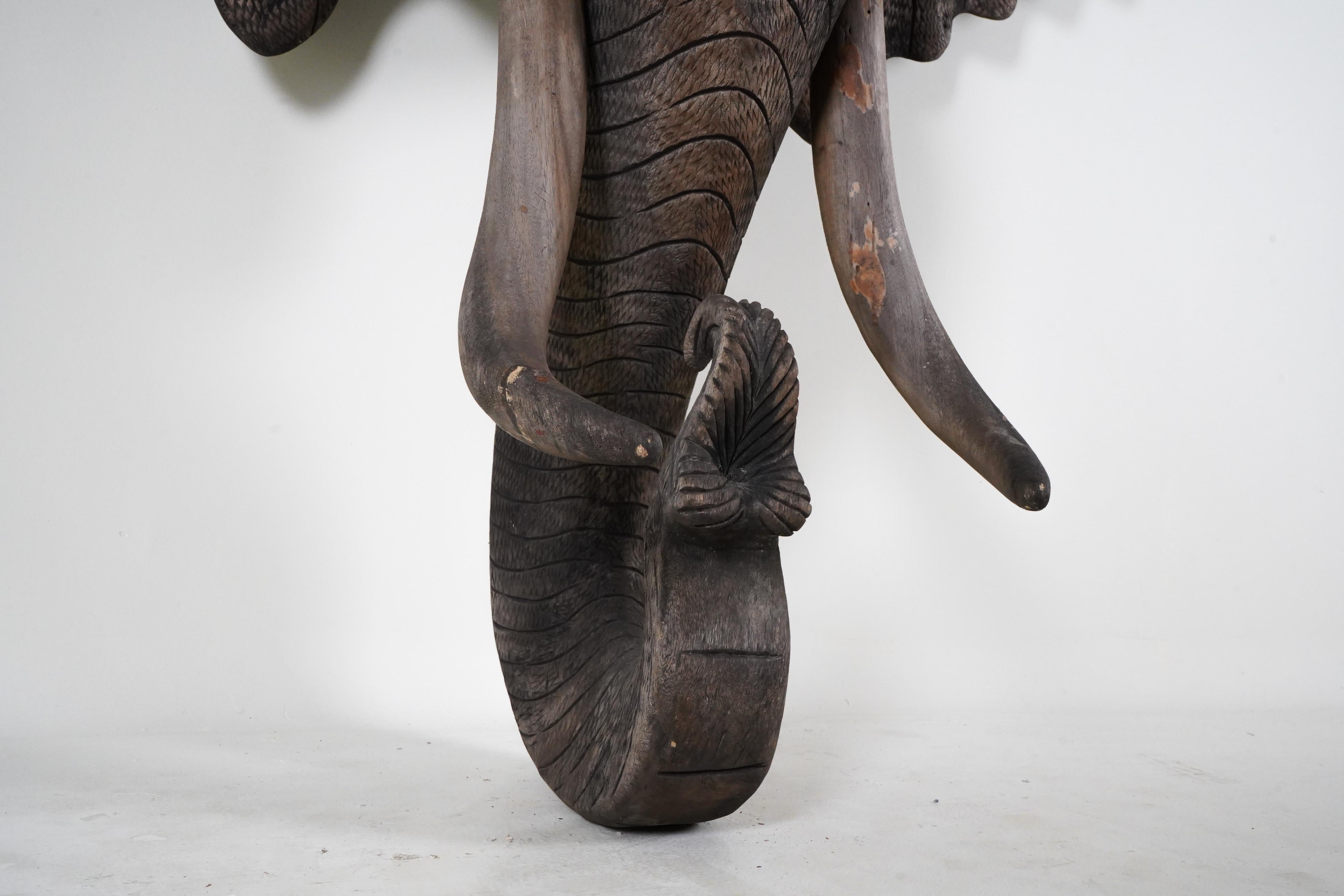 A Monumental Carved Wood Elephant Head 1