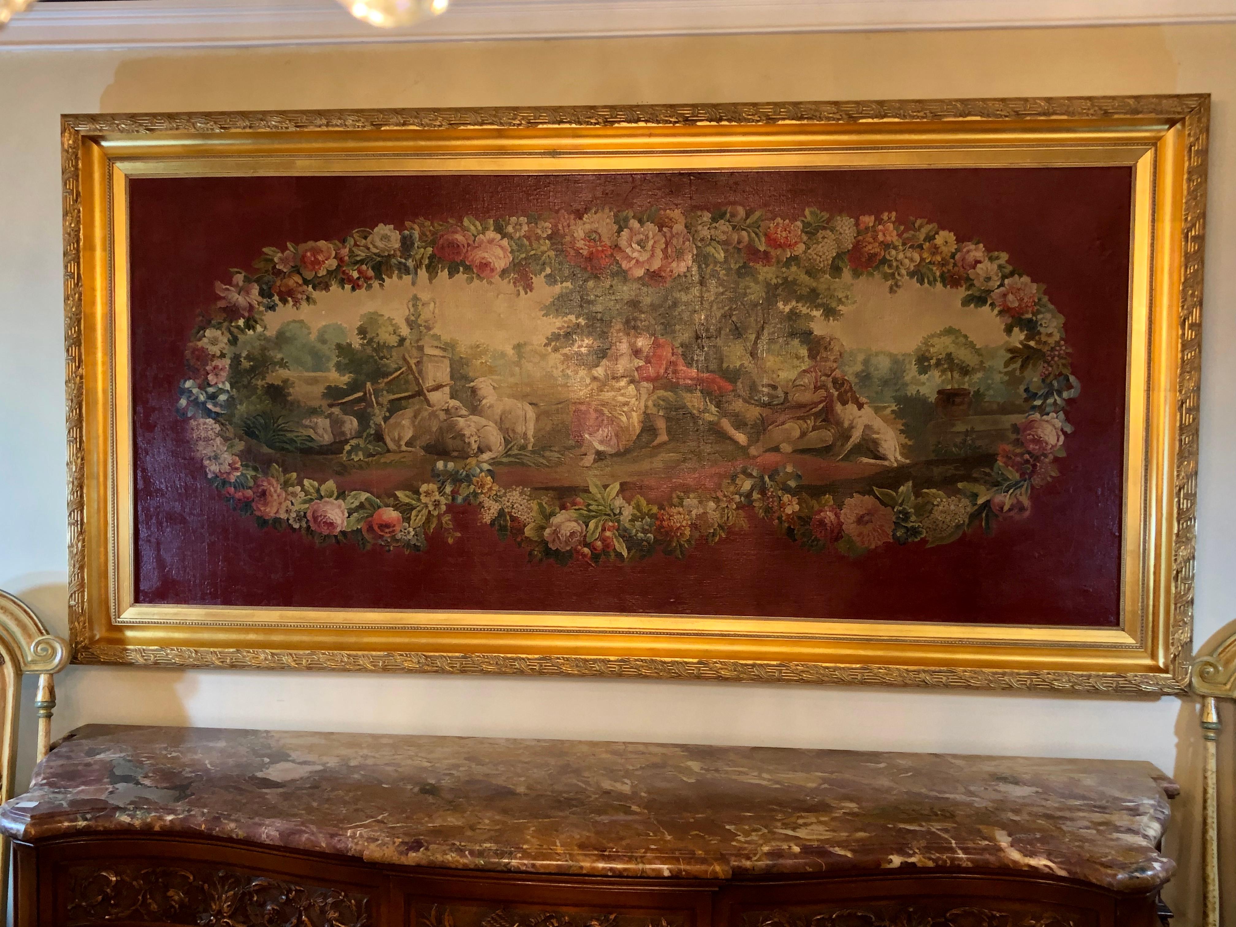 A monumental French oil on canvas 19th-20th century lovers in the field. This wonderfully detailed oil on canvas has been relined and sits in a custom gilt gold carved frame that is five inches in width. We acquired this Fine work directly from a