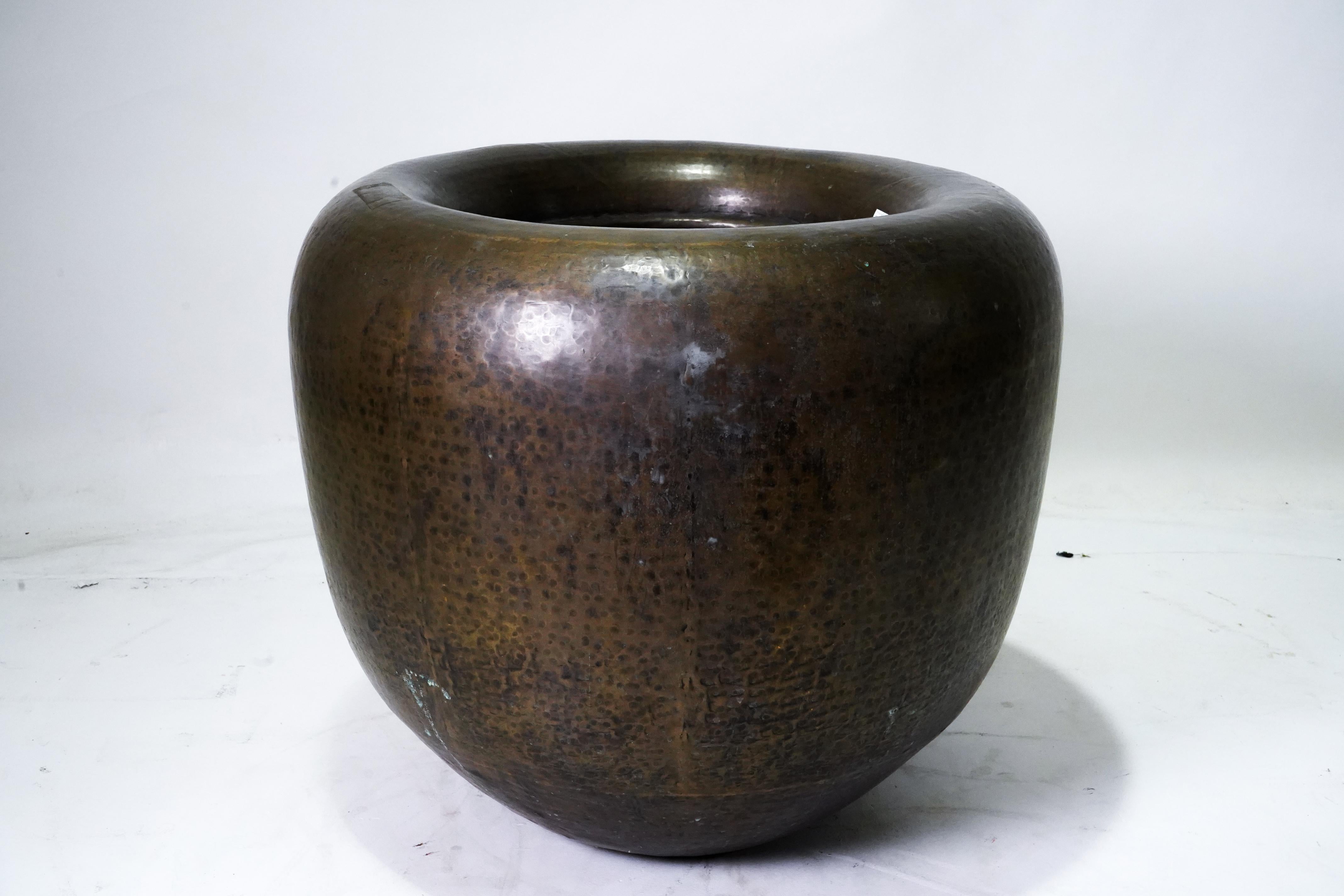 A Monumental Hammered brass pot. Price is for each.
  