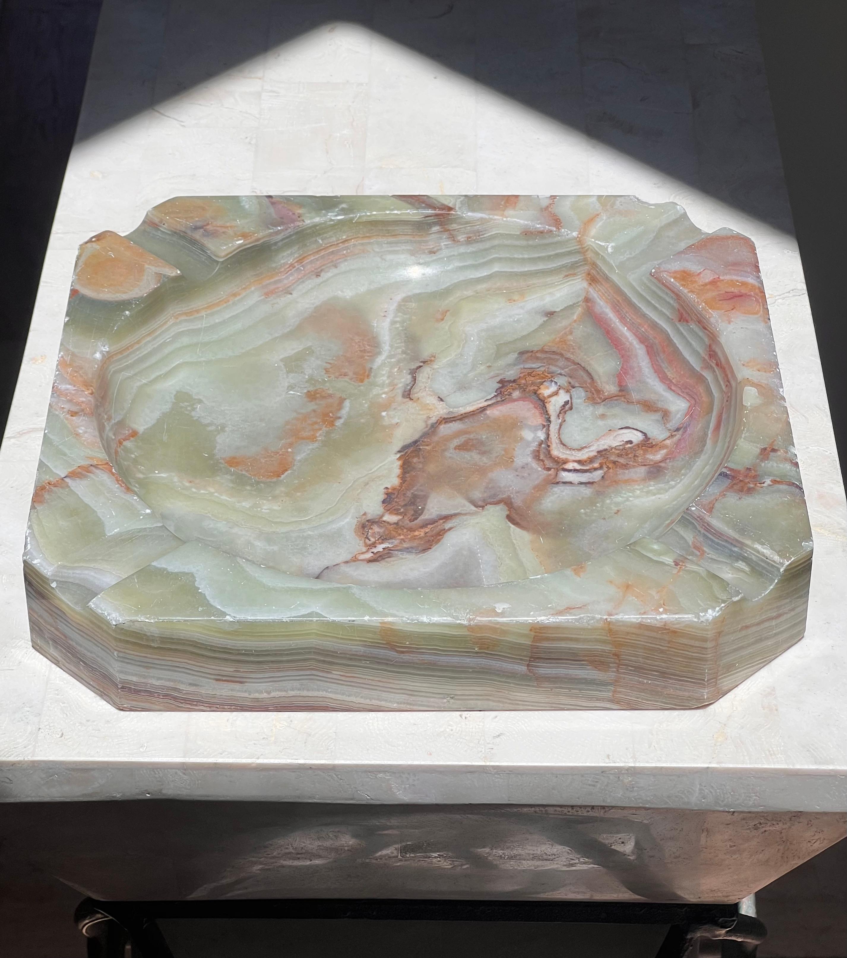 A monumental - over 10 inches square - stone ashtray hand-carved out of onyx, probably mid 20th century. Thick chunky edges with a rivulet at each corner. Pick up in central west Los Angeles or we ship worldwide. 