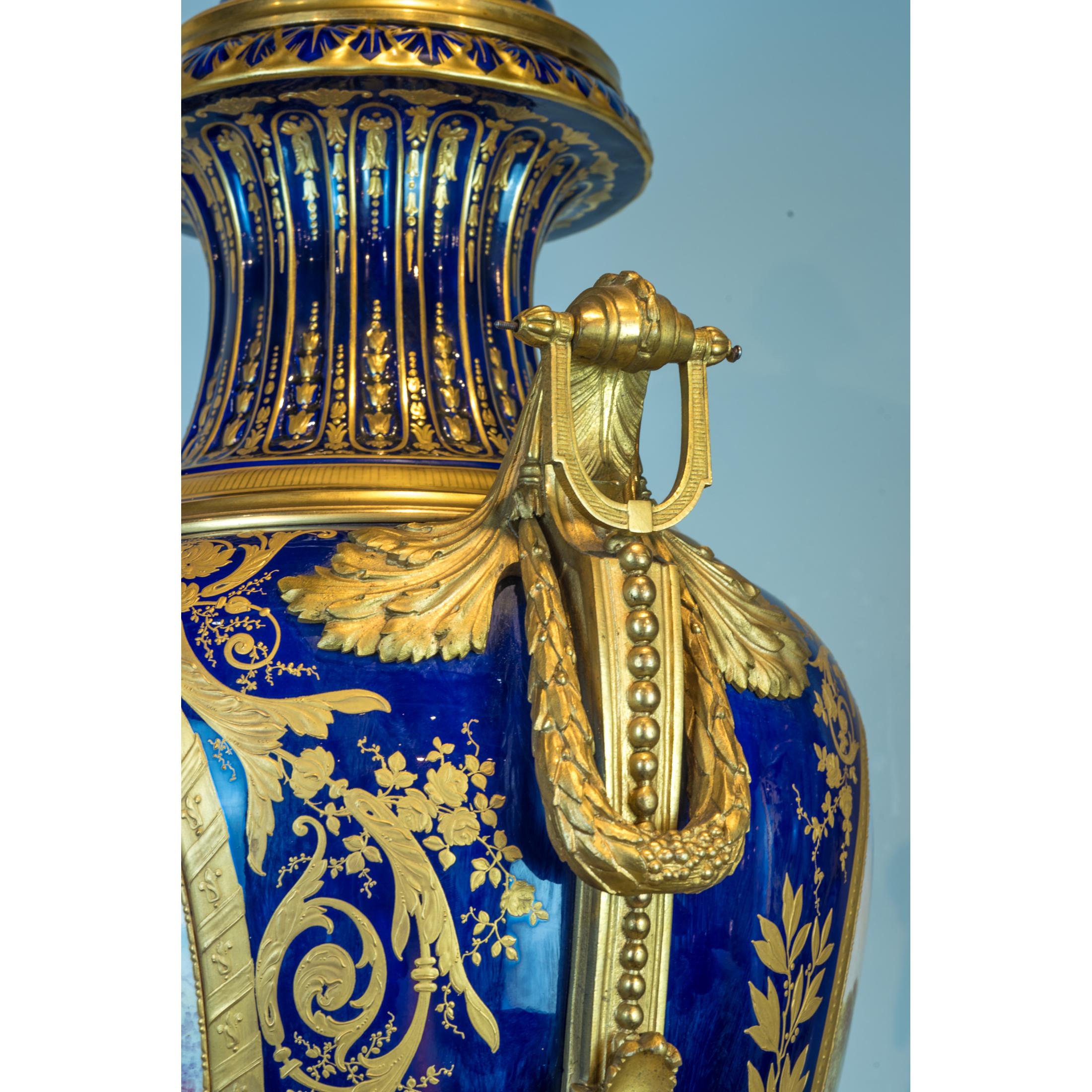 Monumental Pair of Magnificent Ormolu Mounted Sèvres Porcelain Vases In Good Condition For Sale In New York, NY