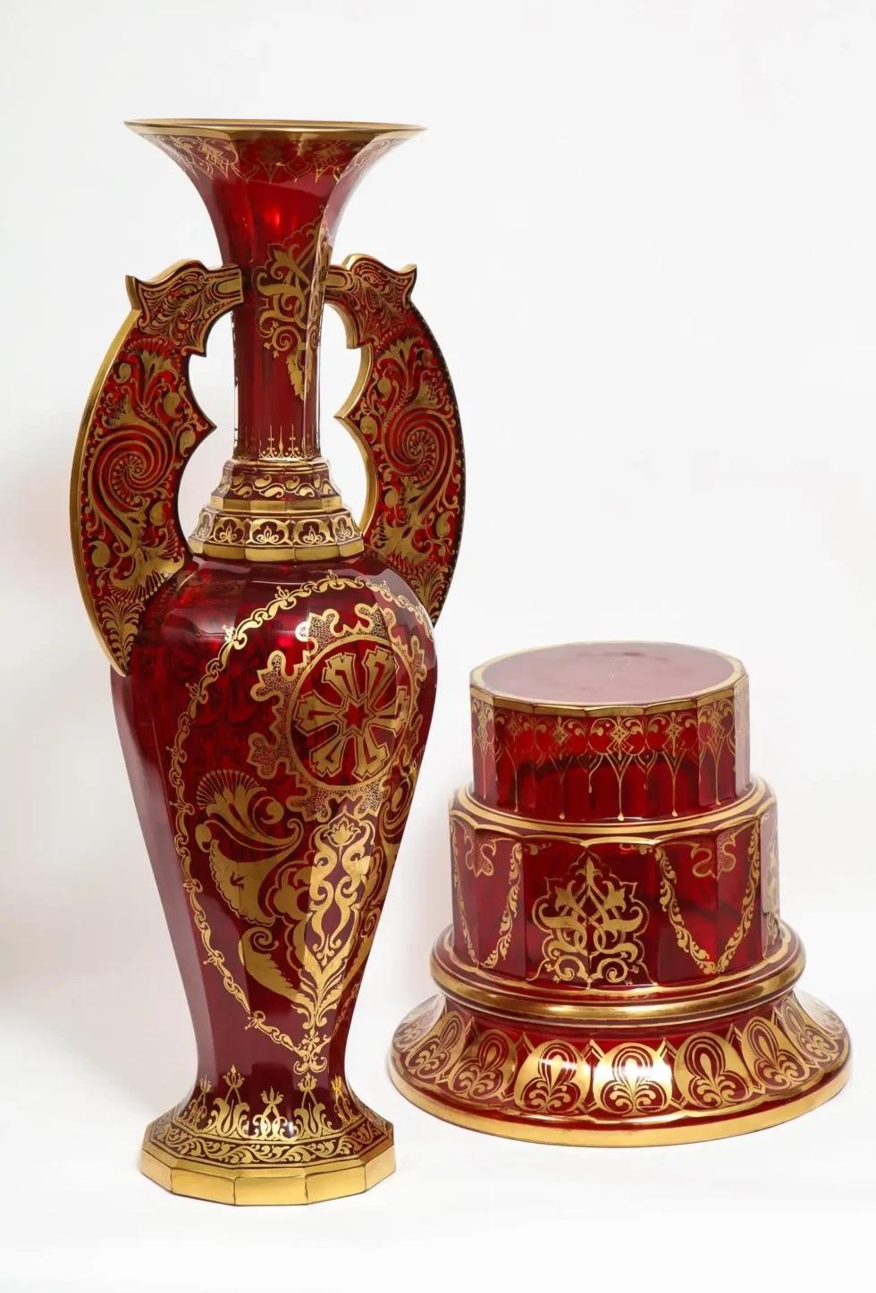 A monumental pair of ruby red gilt Bohemian 