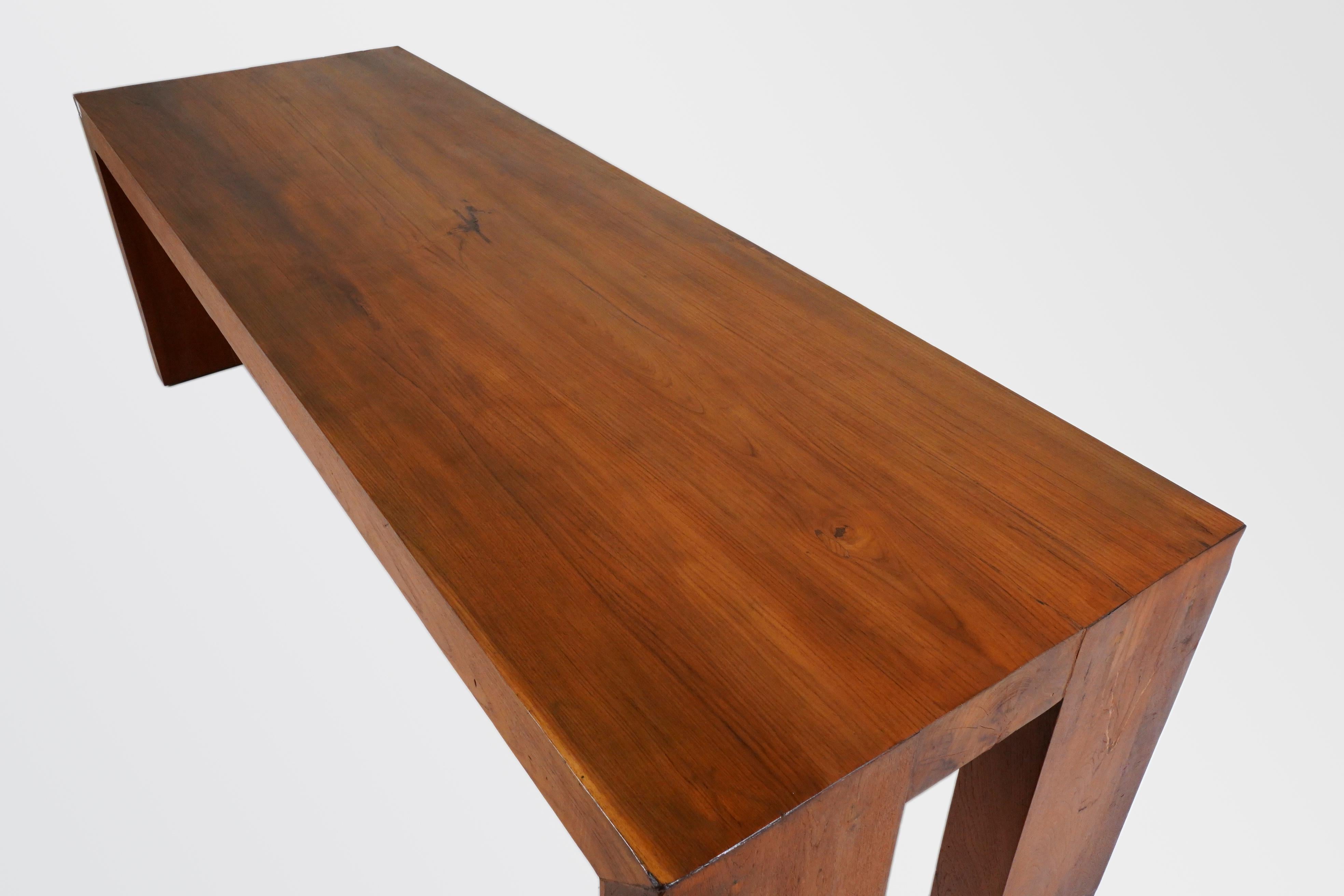 Contemporary A Monumental Teakwood Dining Table For Sale
