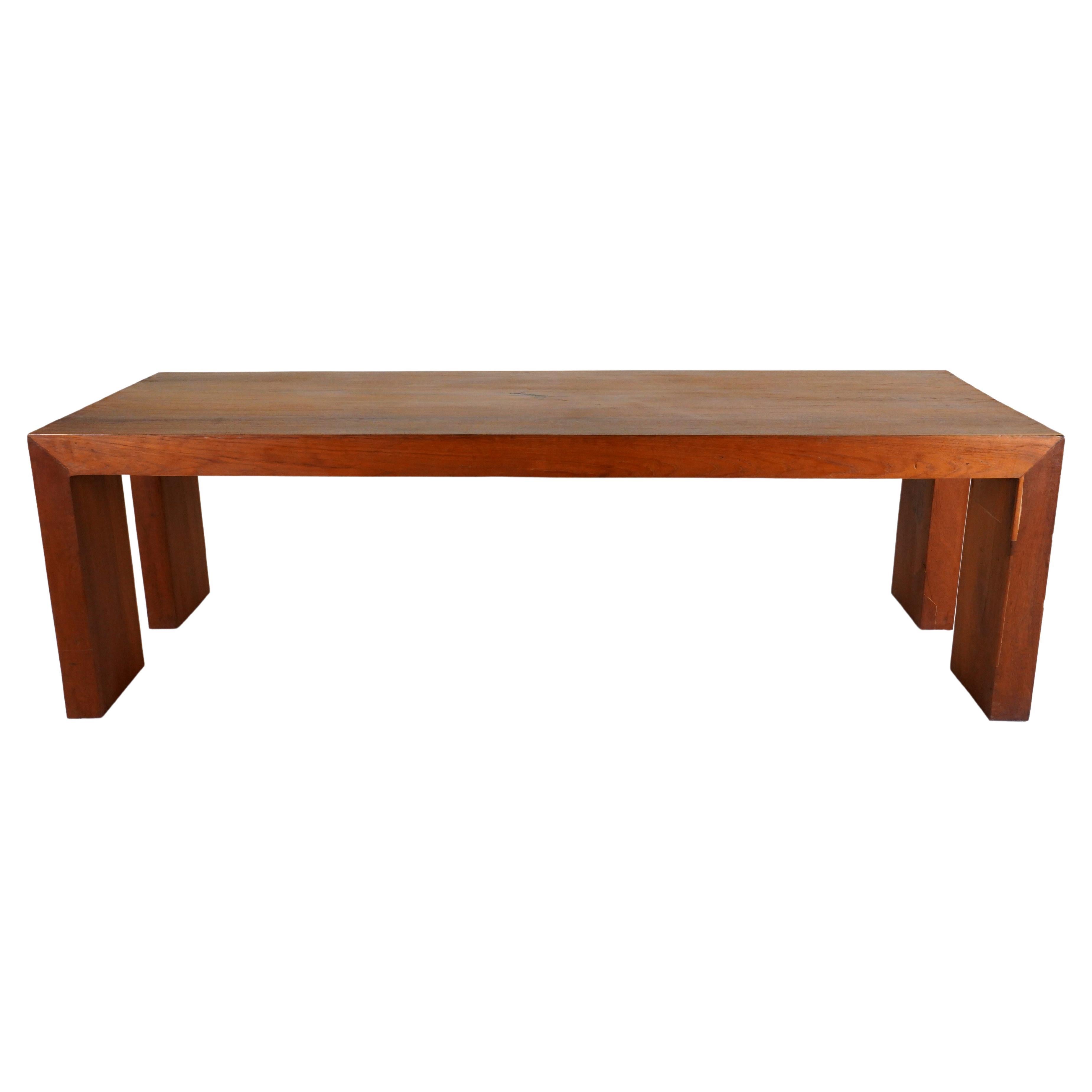 A Monumental Teakwood Dining Table For Sale