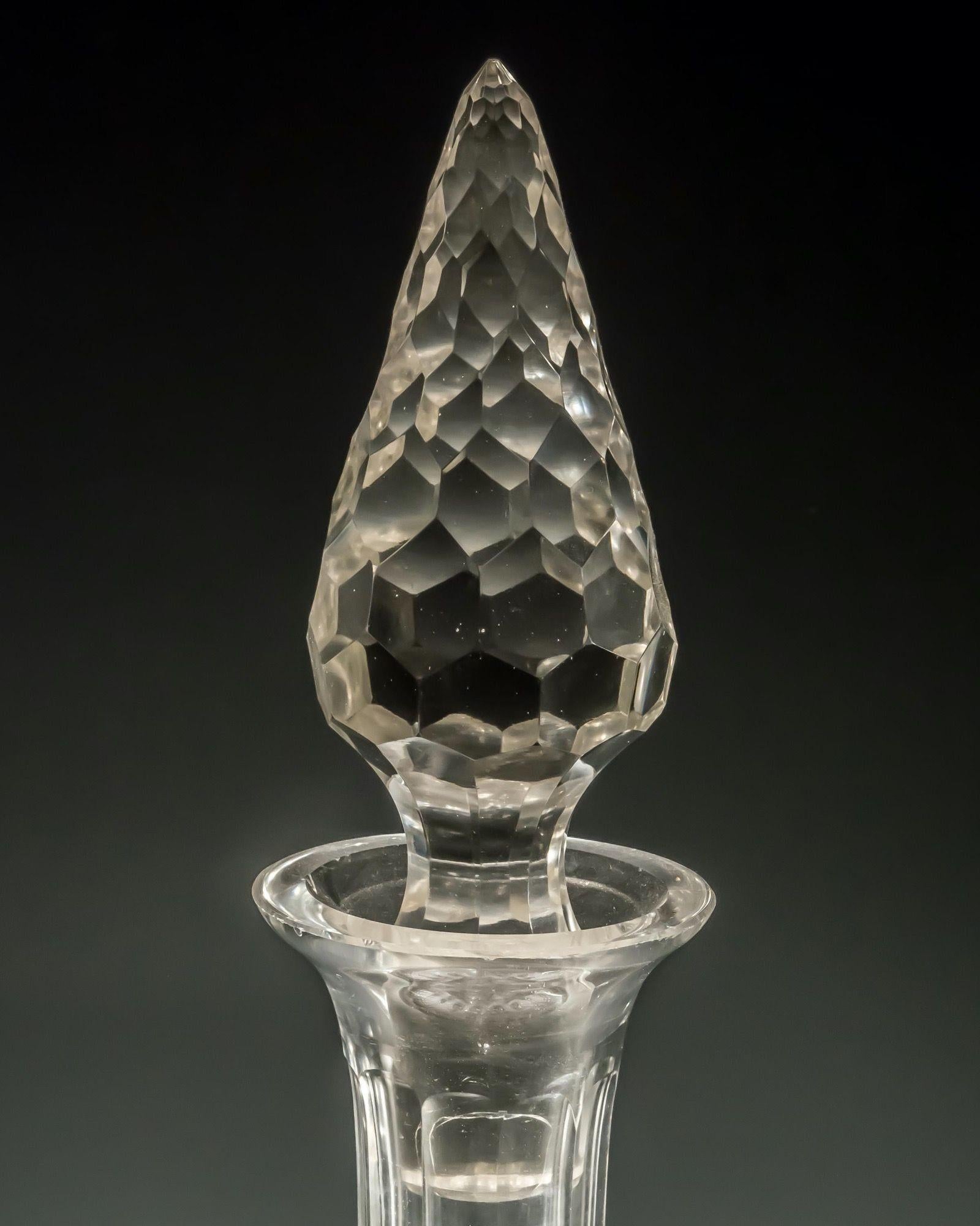 A monumental Victorian hobnail cut rehoboam decanter on a star cut pedestal foot.
Measures: Height 68 cm (26 3/4