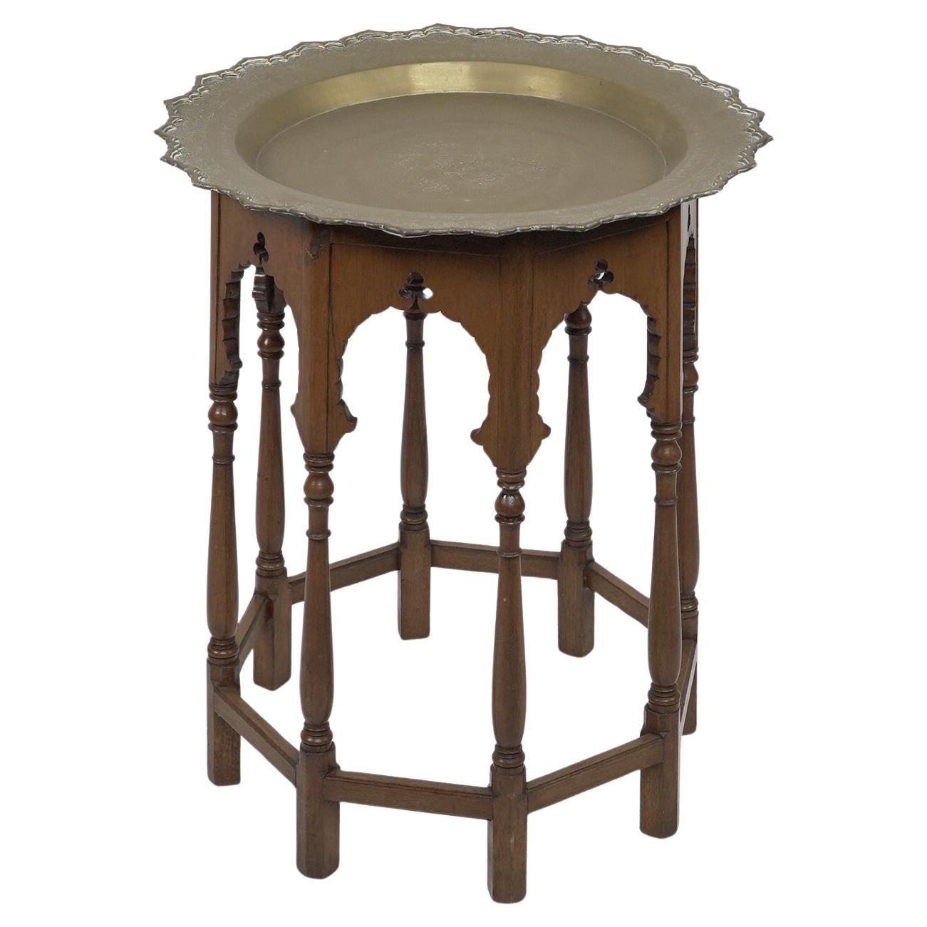A Moorish-style side table with a heavy brass removable dish-shaped table top For Sale