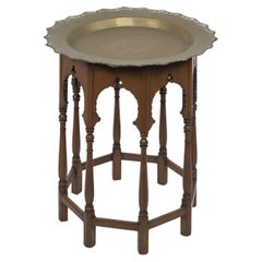 Antique A Moorish-style side table with a heavy brass removable dish-shaped table top