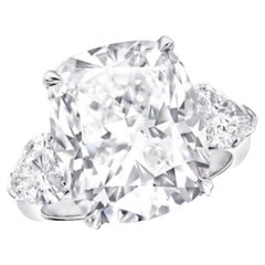 A MORCHA 3ct Cushion Diamond Ring set with 2 Pear shape side diamonds.GIA
