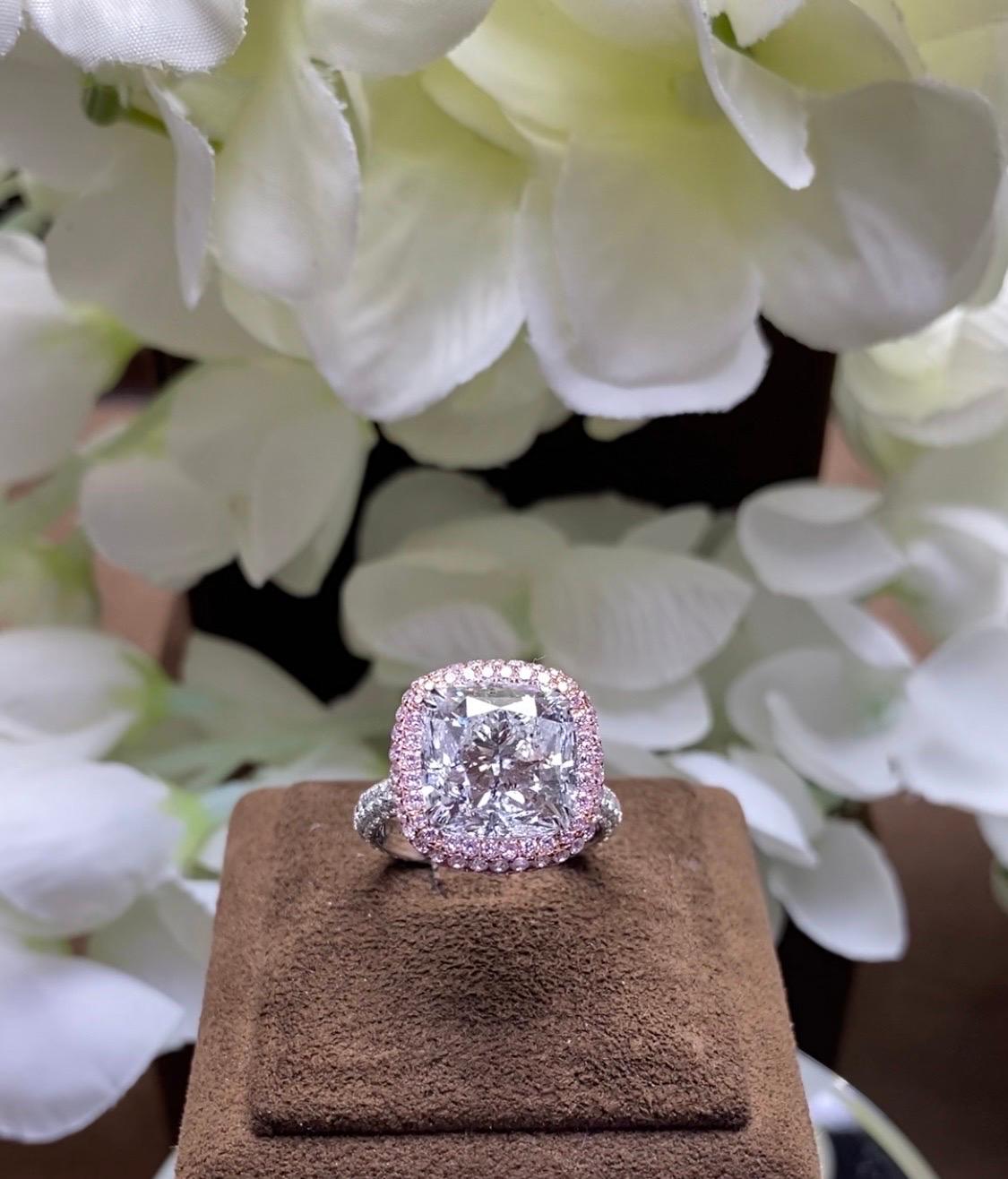 A MORCHA 6.5ct Cushion Diamond,
D color, cut to the highest standards of Brilliance and Light Return. 
Set with 18k White/Rose Gold. 
Pave diamonds - White & Fancy Pink diamonds 
The Diamond ring was designed by our in-house team of designers,