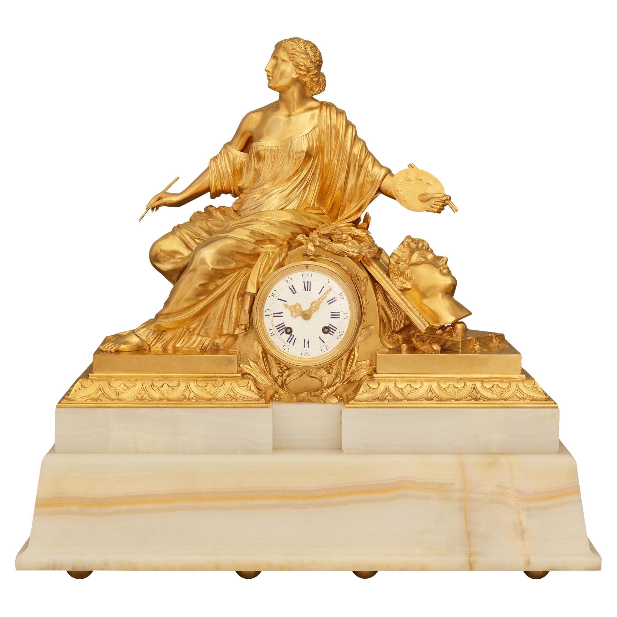 A most decorative French 19th century Louis XVI st. Onyx and Ormolu mantel clock