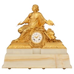 Antique A most decorative French 19th century Louis XVI st. Onyx and Ormolu mantel clock